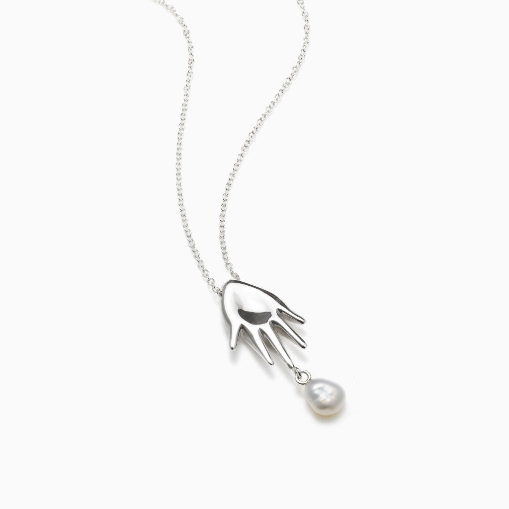 AGMES .925 Sterling Silver abstract hand mini lee pendant with freshwater pearl drop.