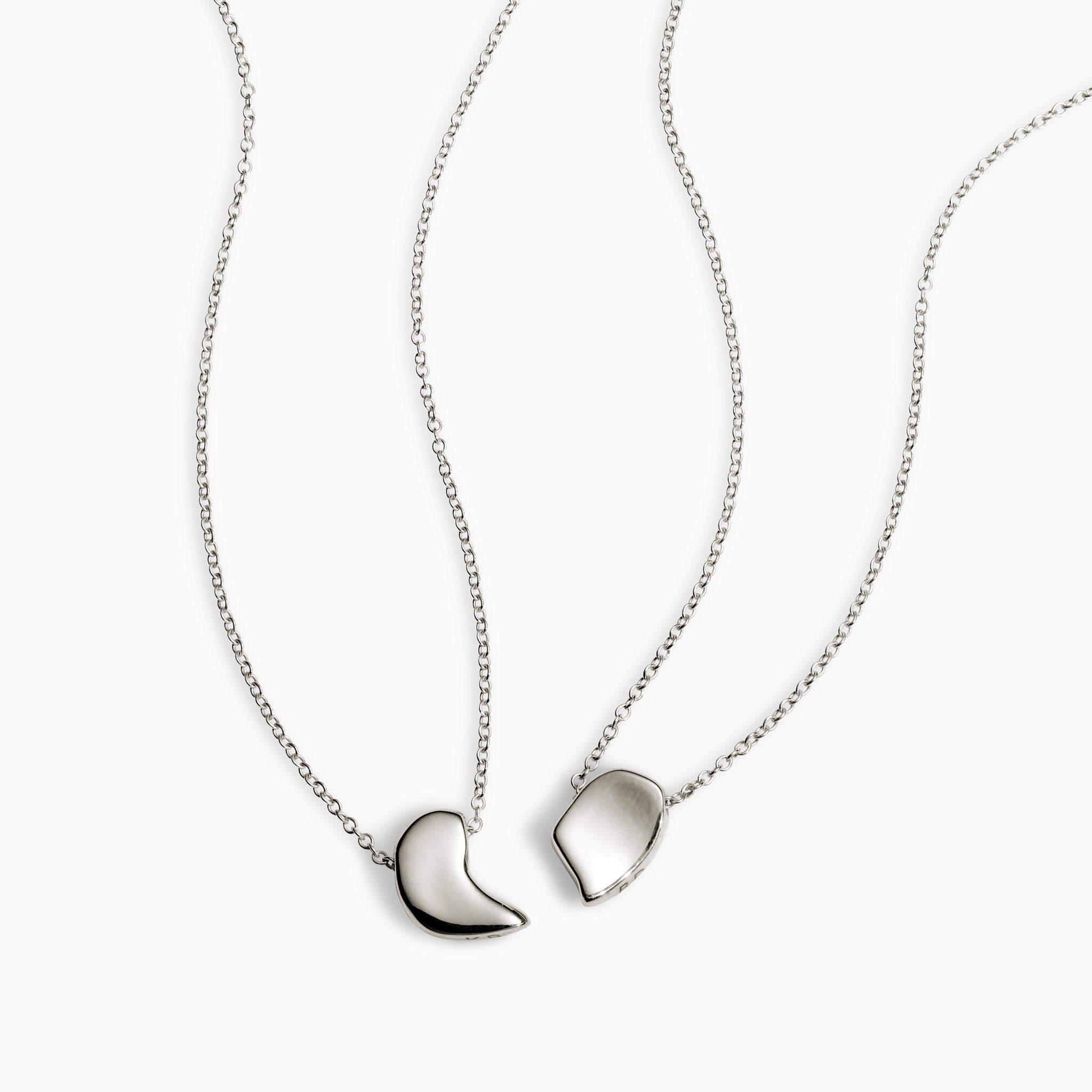 AGMES .925 Sterling Silver Sum of Parts Pendant Set. Modern connecting heart necklace.