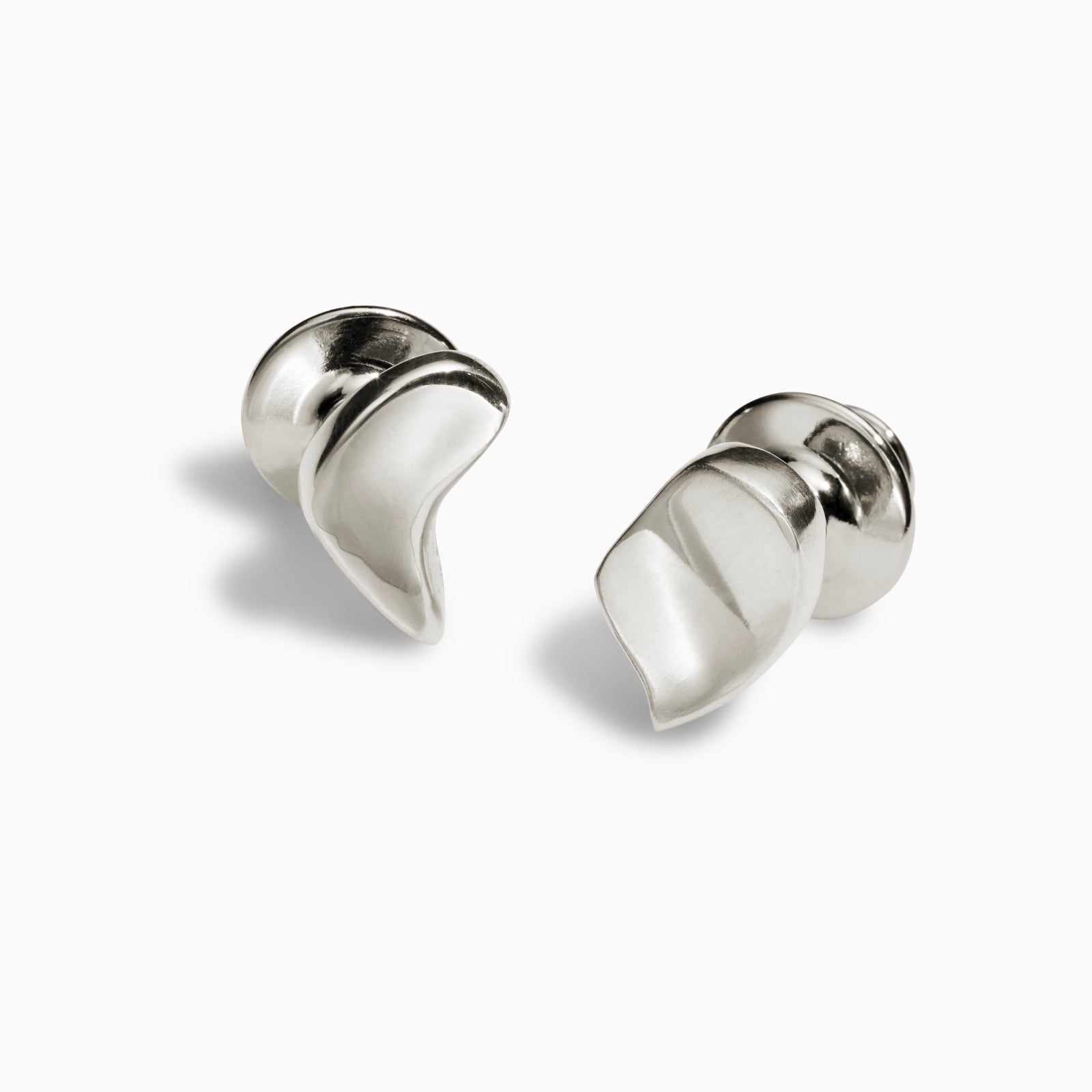 AGMES .925 sterling silver sculptural heart Sum of Parts Tie Tacks on white background.