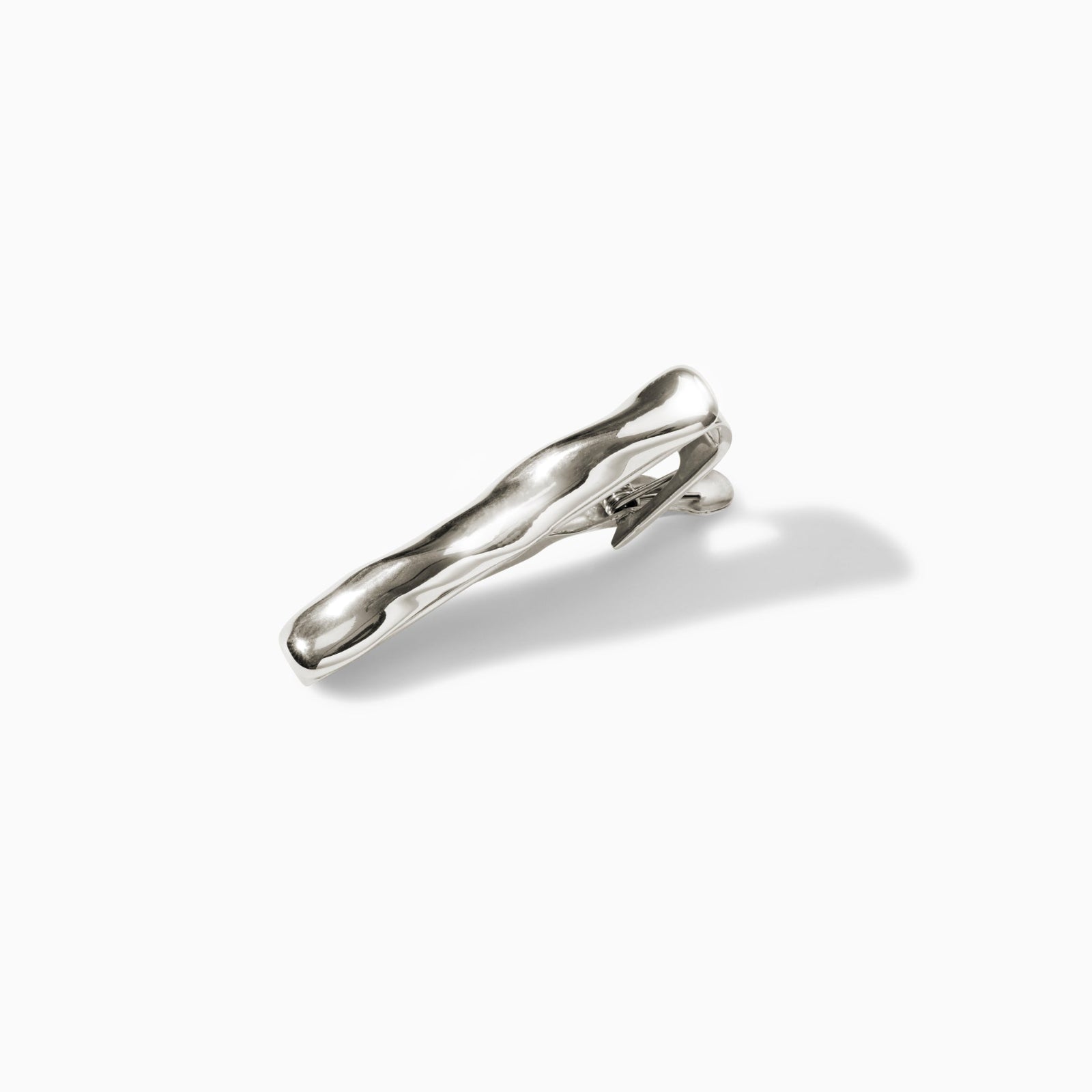 AGMES .925 sterling silver sculptural Astrid Tie Clip on white background.