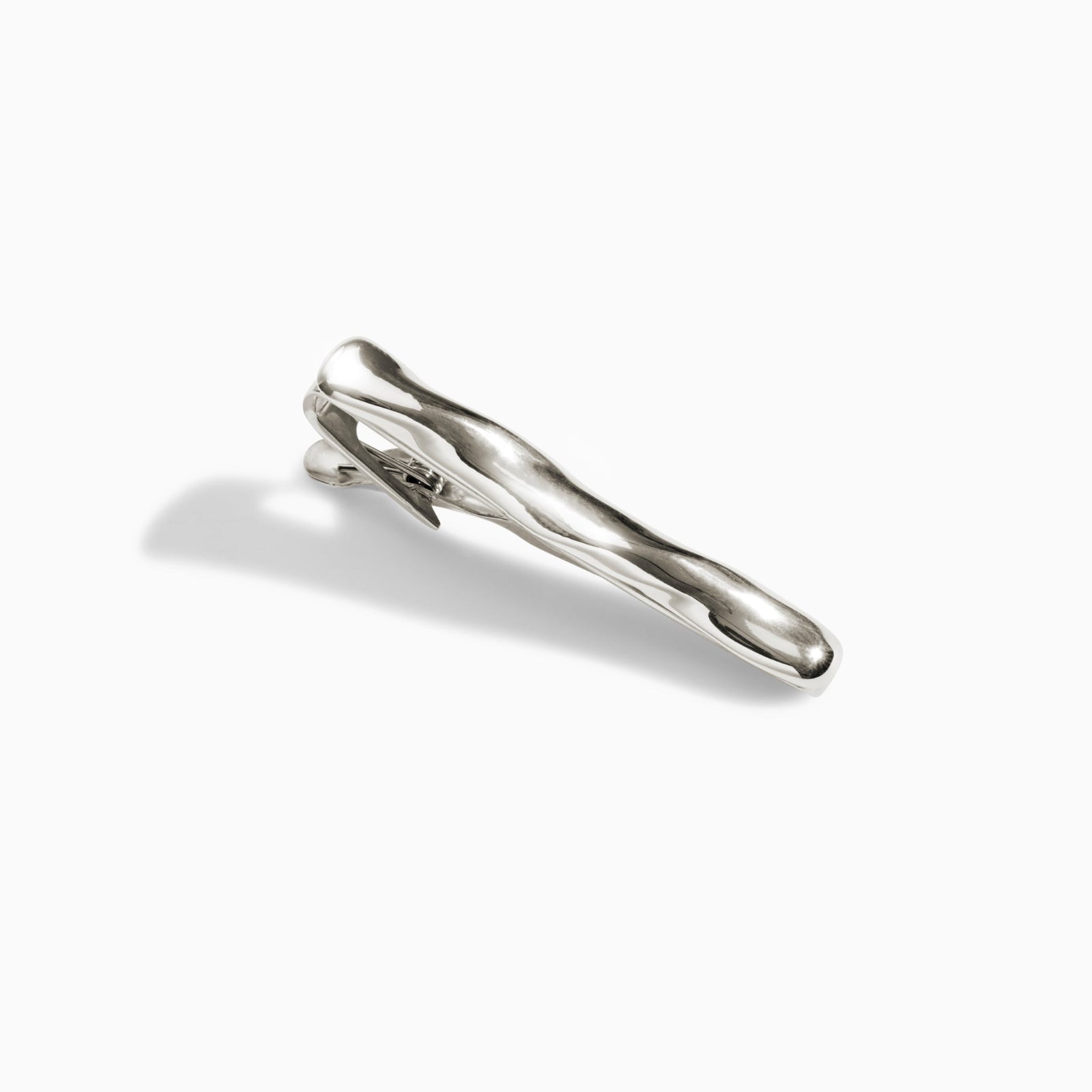 AGMES .925 sterling silver sculptural Astrid Tie Clip on white background.