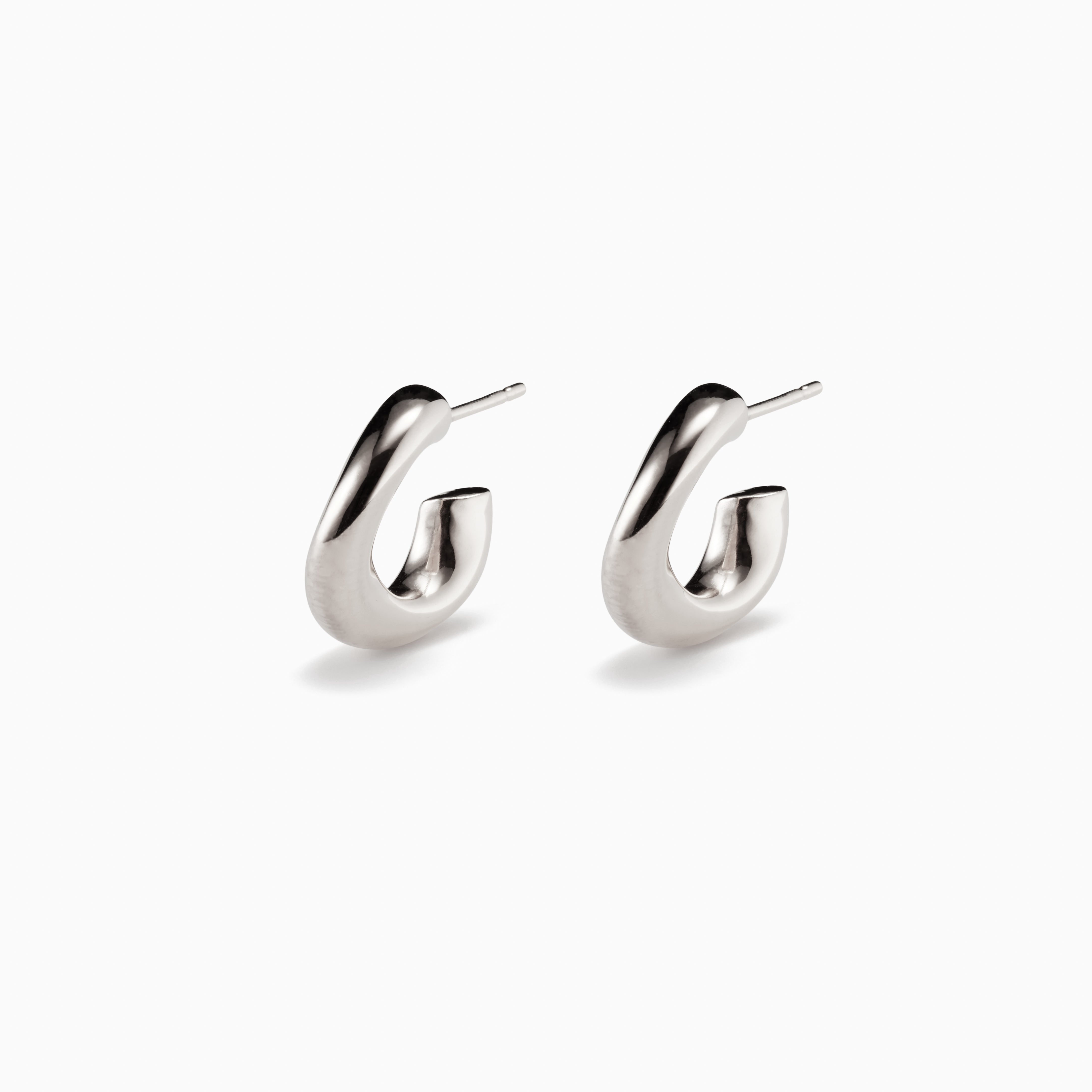 AGMES 0.925 sterling silver mini hoop earrings.
