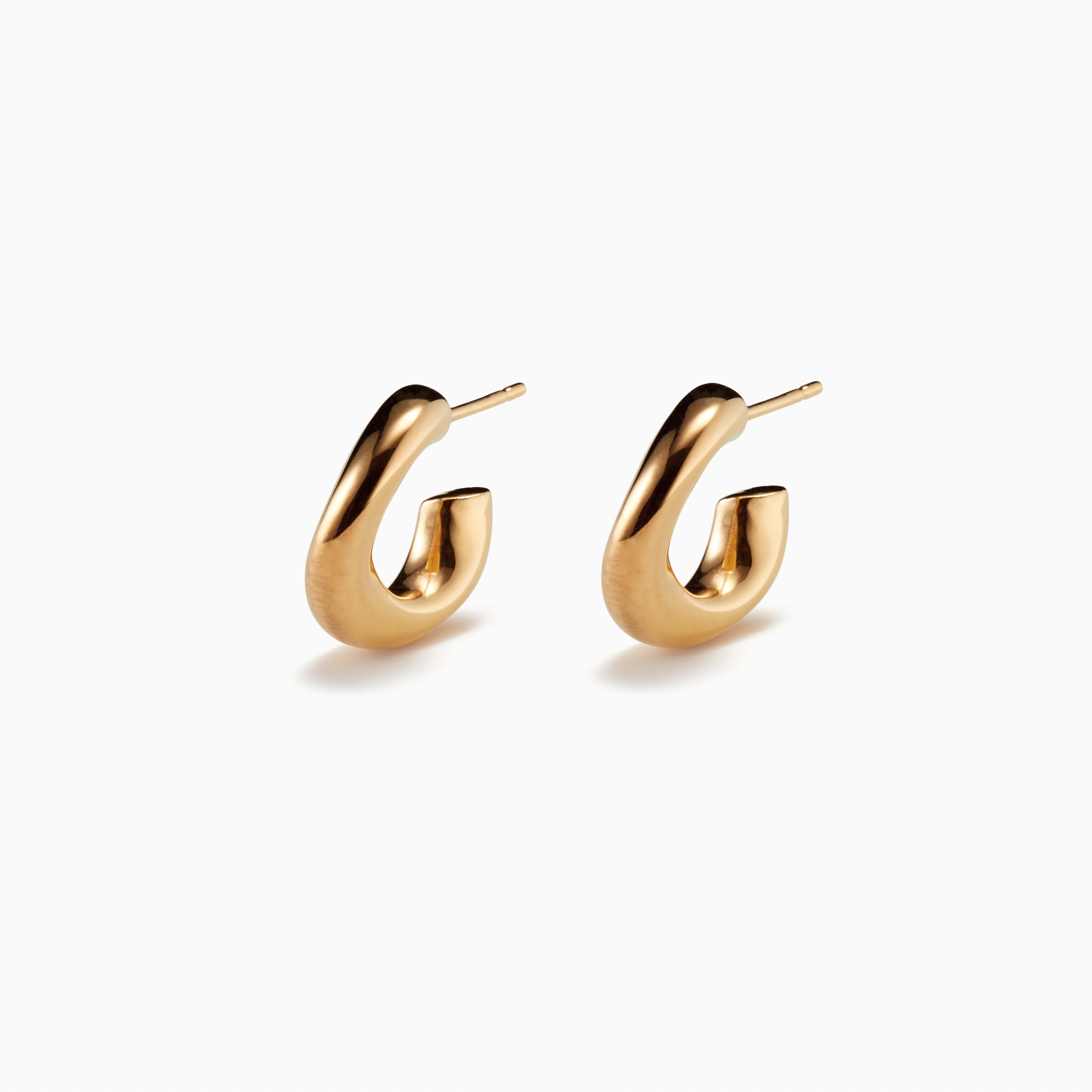 AGMES 18k gold vermeil mini hoop earrings.