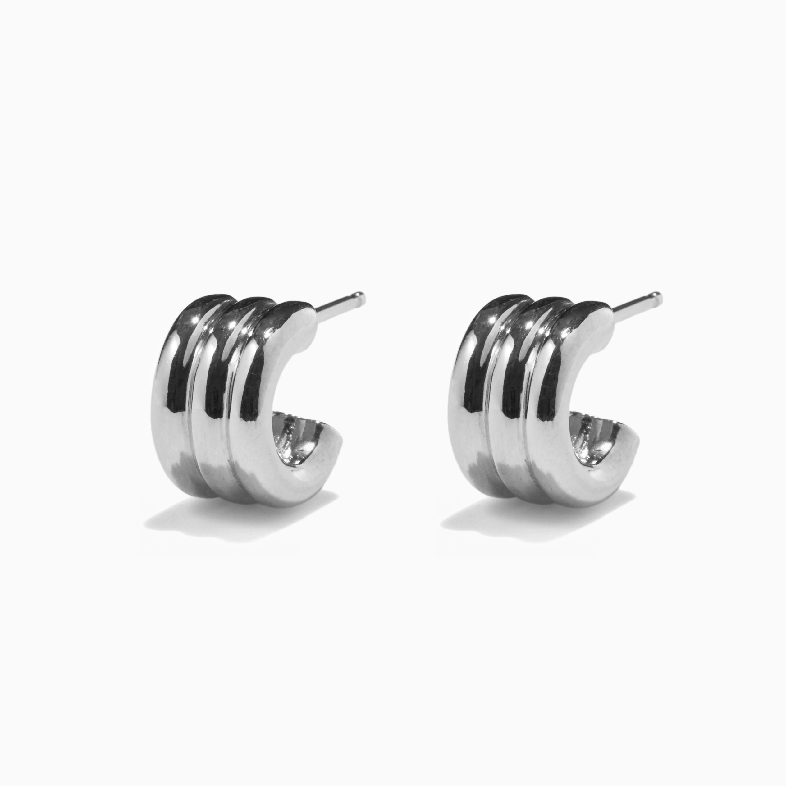 AGMES 0.925 sterling silver triple ridged mini hoop earrings.