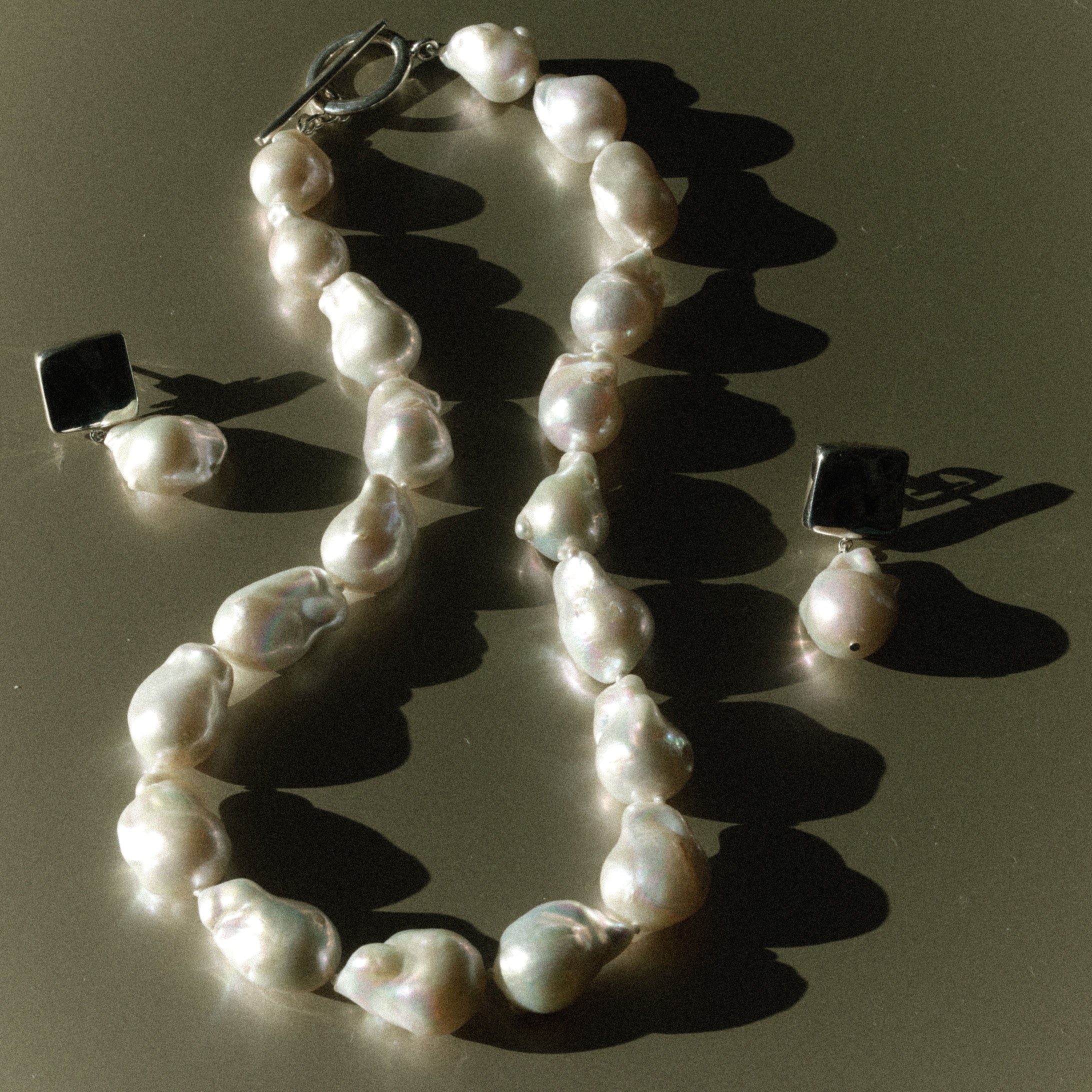 AGMES Baroque freshwater pearl necklace with .925 Sterling Silver T-Bar closure.