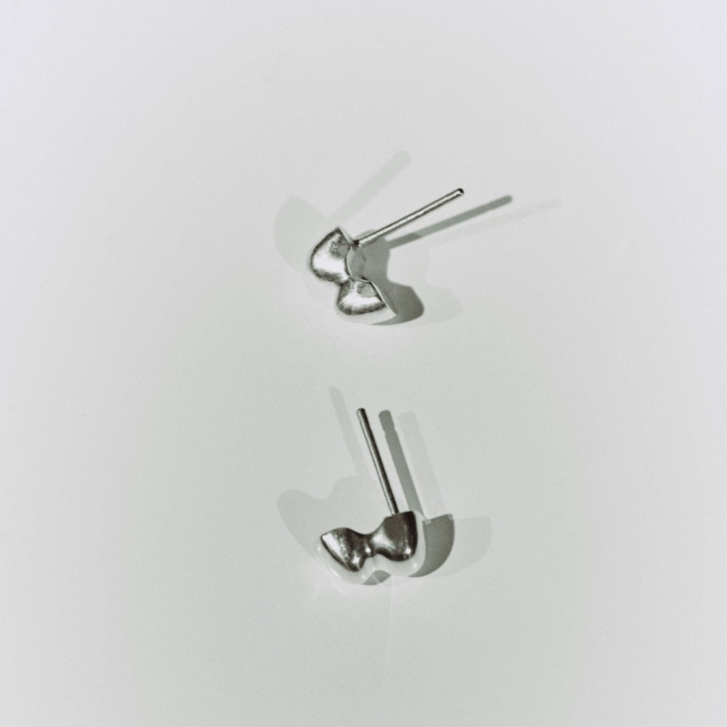 AGMES 0.925 sterling silver sculpted bubble stud earrings.