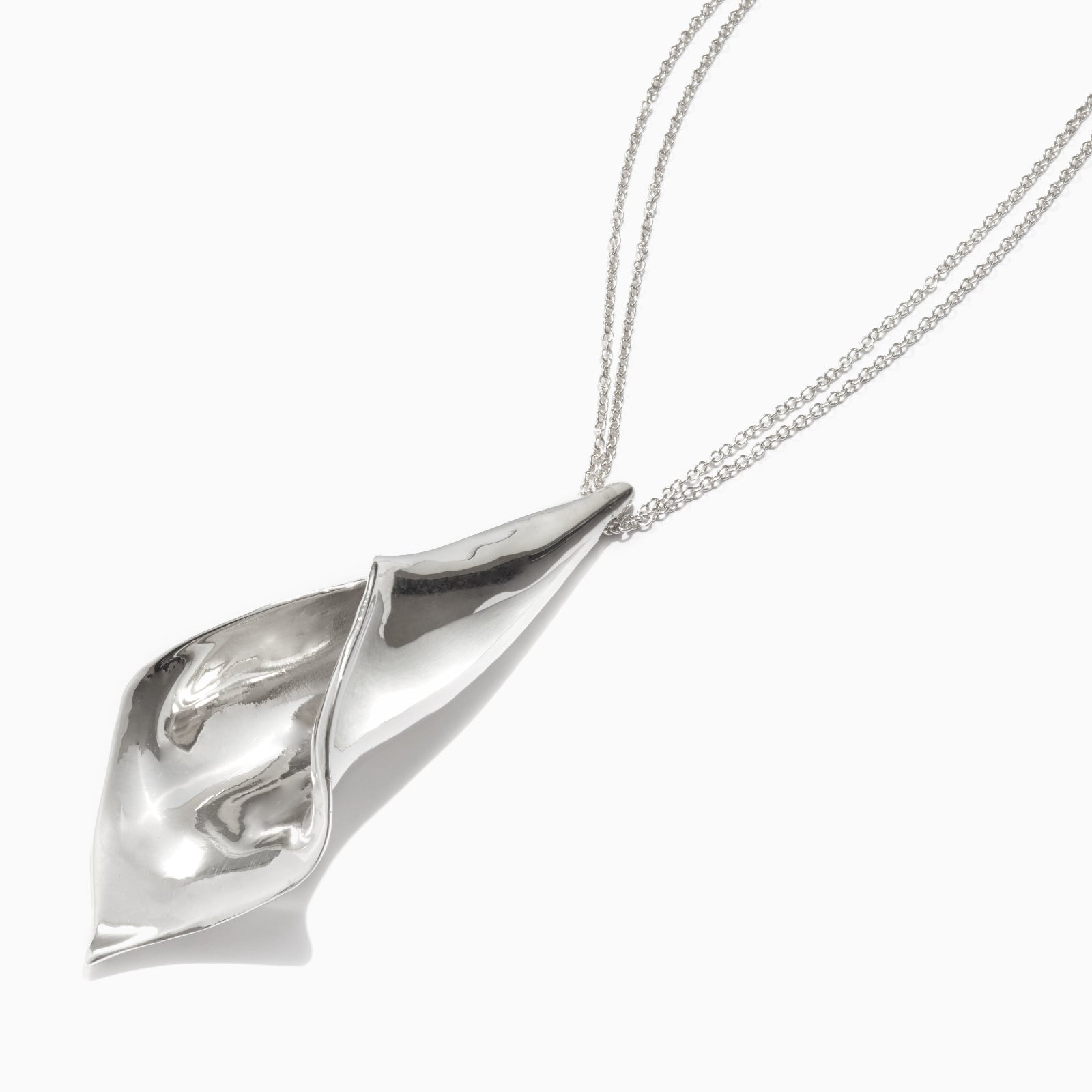 AGMES .925 sterling silver Calla Pendant necklace on white background.