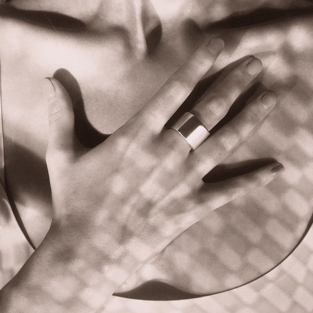 Hand wearing AGMES .925 Sterling Silver Daria Ring.