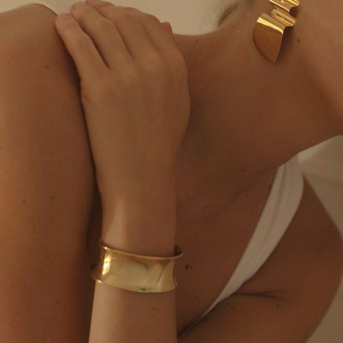 AGMES 18k Gold Vermeil Georgia Cuff worn with 18k Gold Vermeil Mira Earrings.