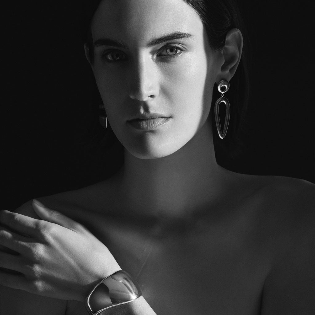 Woman wearing AGMES 925 Sterling Silver Jean Cuff. Large Cuff Bracelet.