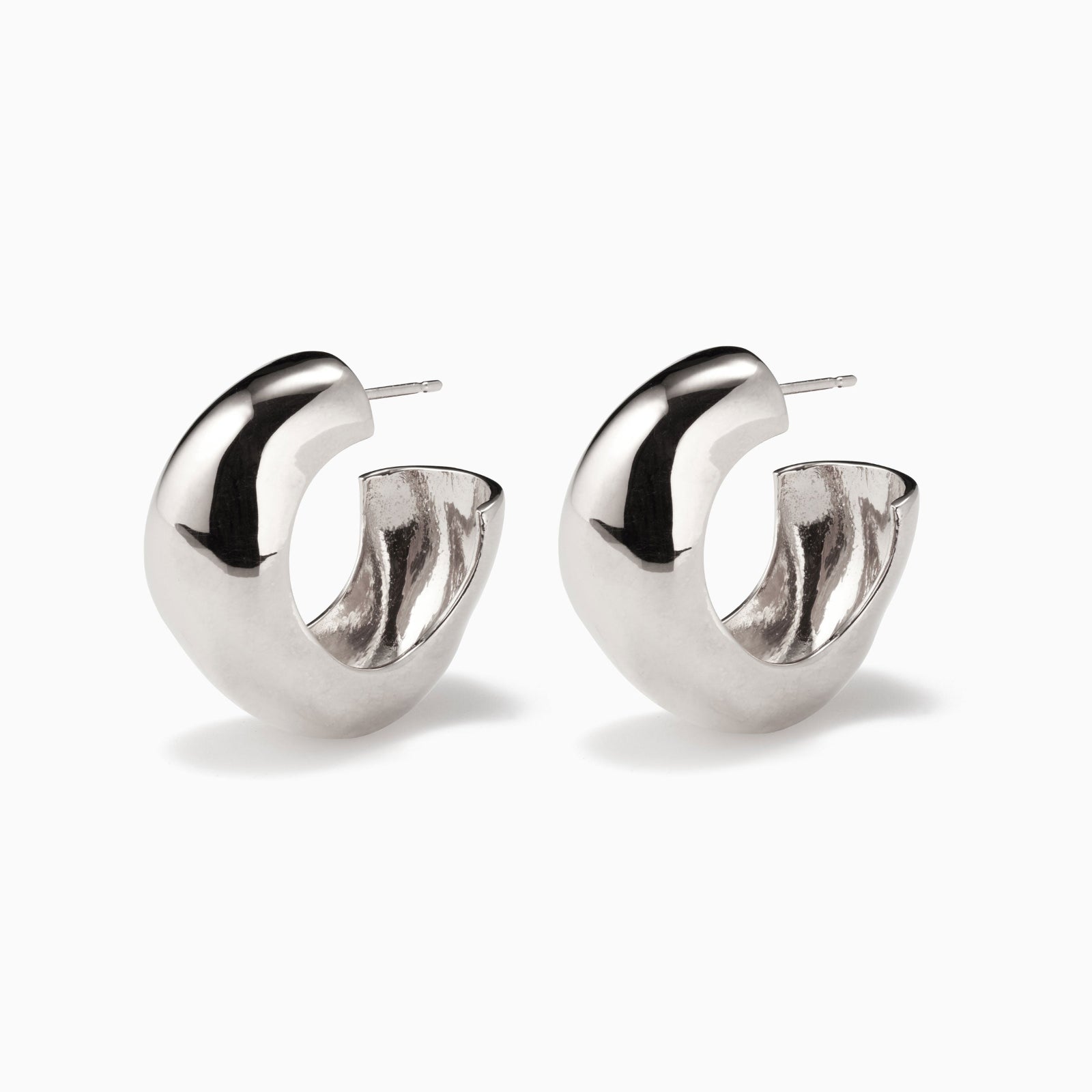 AGMES .925 sterling silver round sculptural Large Celia Hoops on white background.