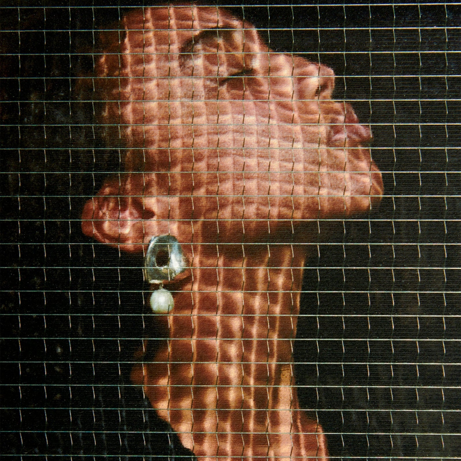 Woman wearing AGMES 0.925 sterling silver sculpted Gertrude pearl drop earrings. Simone Bodmer-Turner.