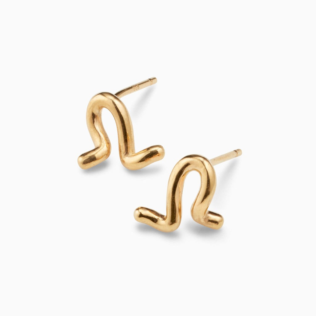 AGMES 18k gold vermeil small twisted stud earrings.