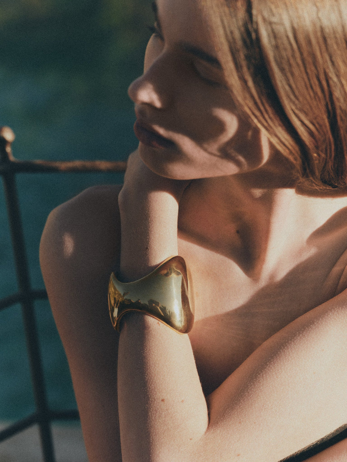 Woman wearing AGMES 18k Gold Vermeil Giselle Cuff. Large Cuff Bracelet. 