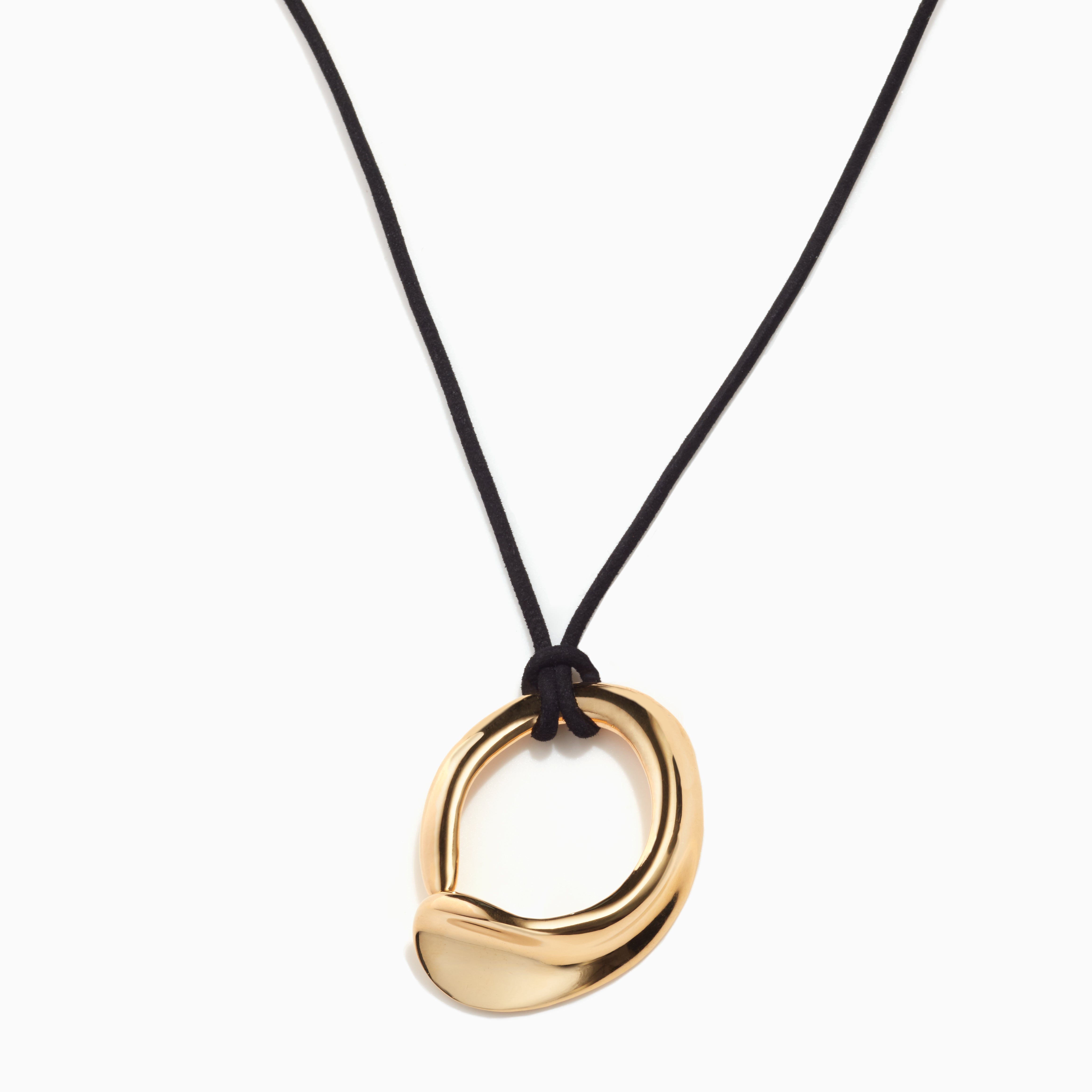 AGMES 18k Gold Vermeil Marta Pendant with black suede cord on white background. 