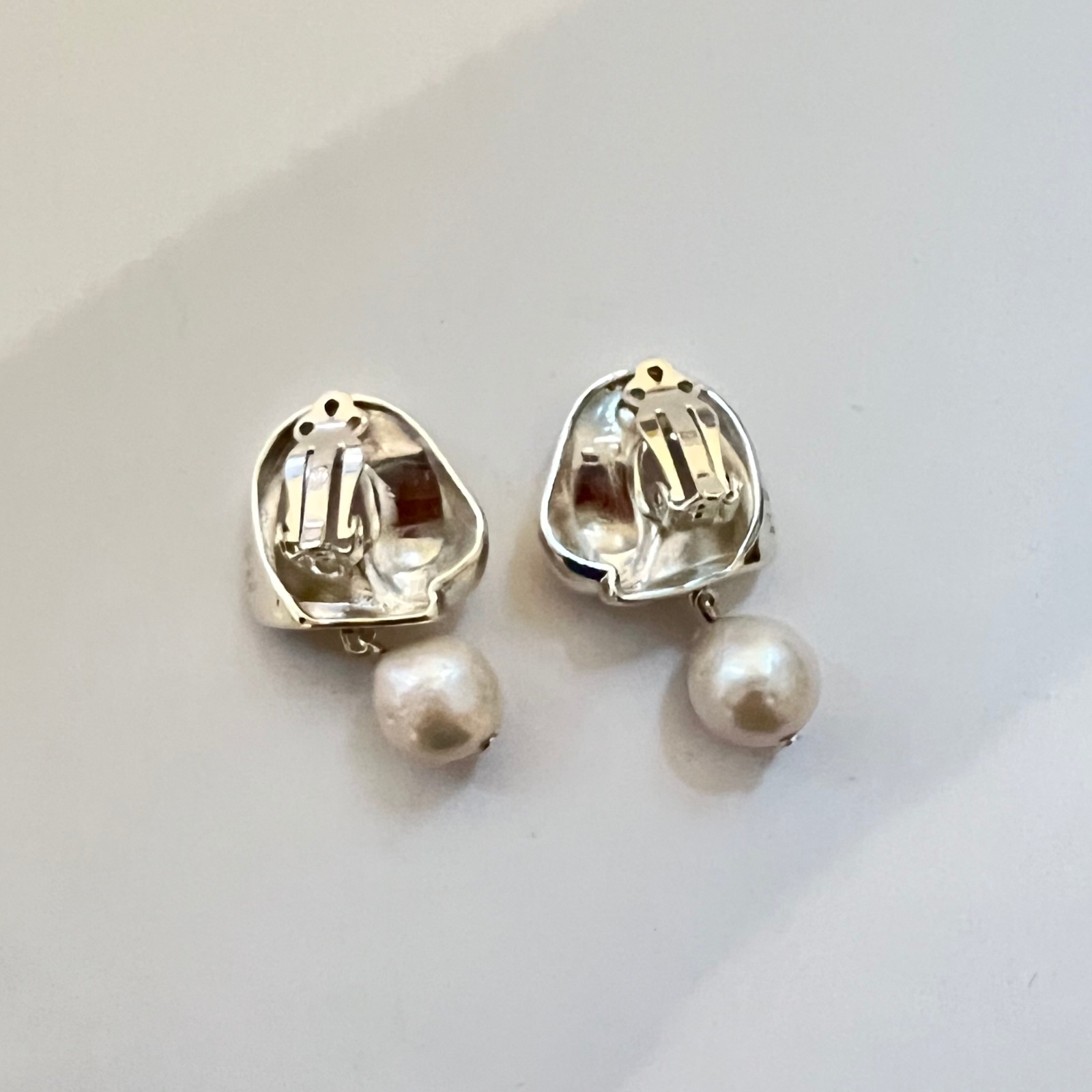 AGMES .925 Sterling Silver Sandra Clip-on Earrings with Freshwater Pearl drop on white background. 