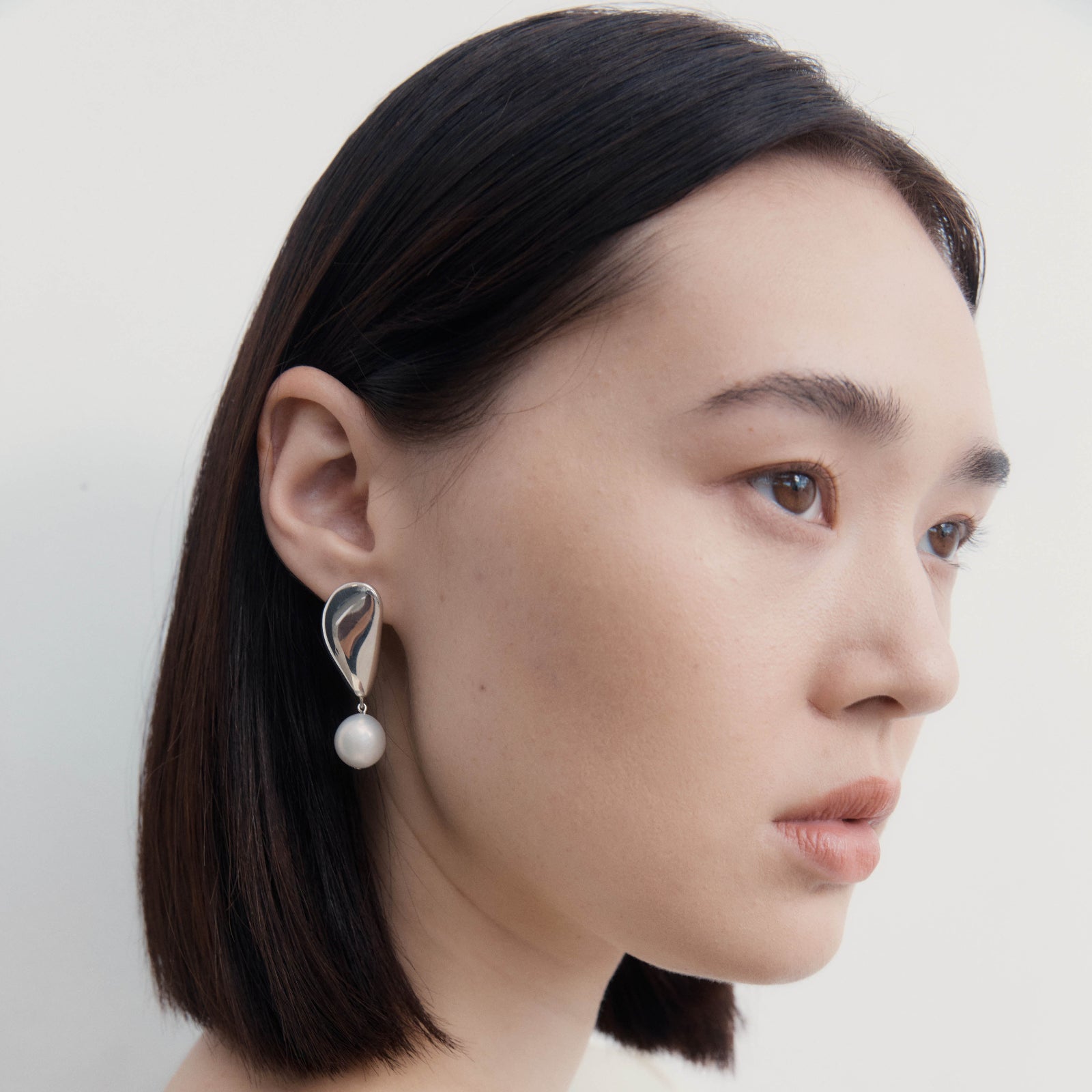 AGMES .925 Sterling Silver Sherri Earrings with freshwater baroque pearl drop. 