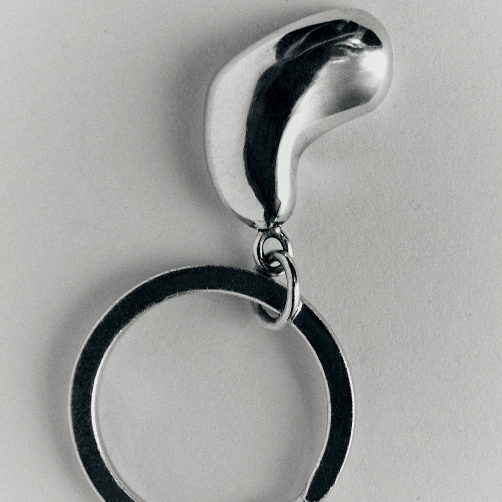 AGMES .925 sterling silver Small Sculpted Heart Keychain on white background.