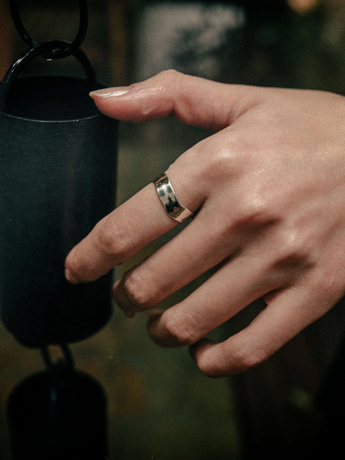 Person wearing AGMES 0.925 Sterling Silver Wave Ring.