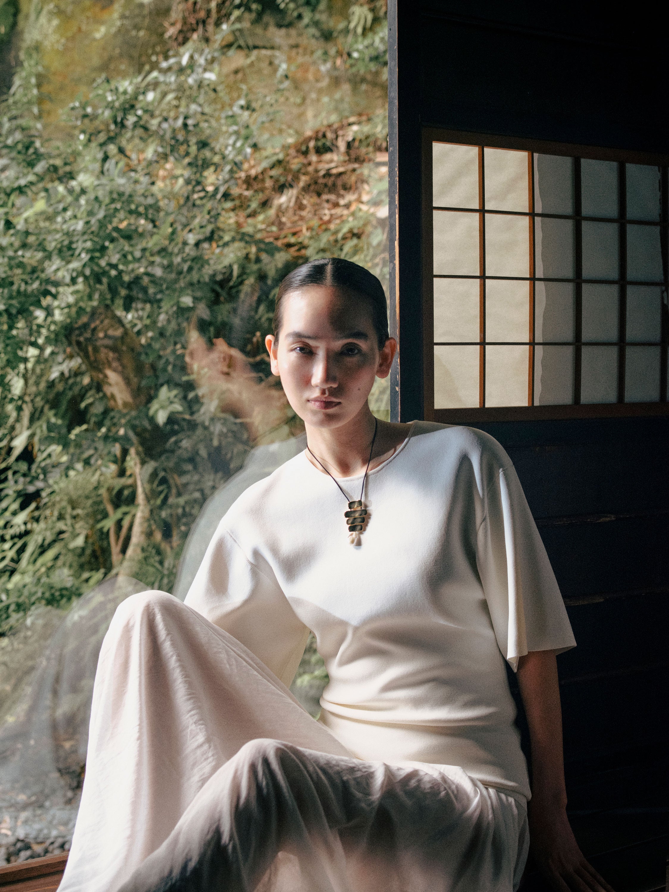 AGMES 18k yellow gold vermeil Baroque Ilona Pendant with freshwater pearl drop on black suede cord 
