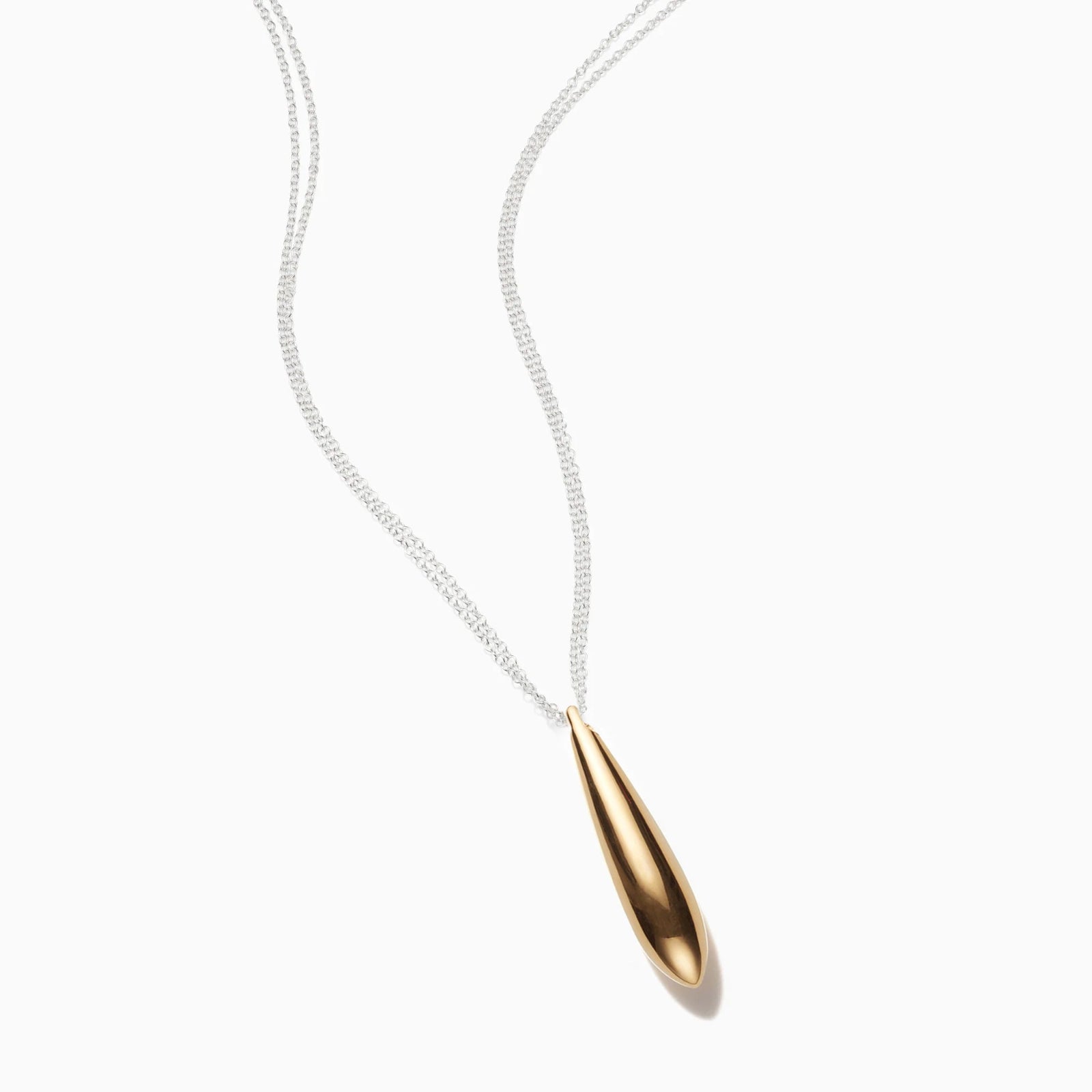 AGMES 18 gold vermeil teardrop shaped necklace on double chain. On white background.