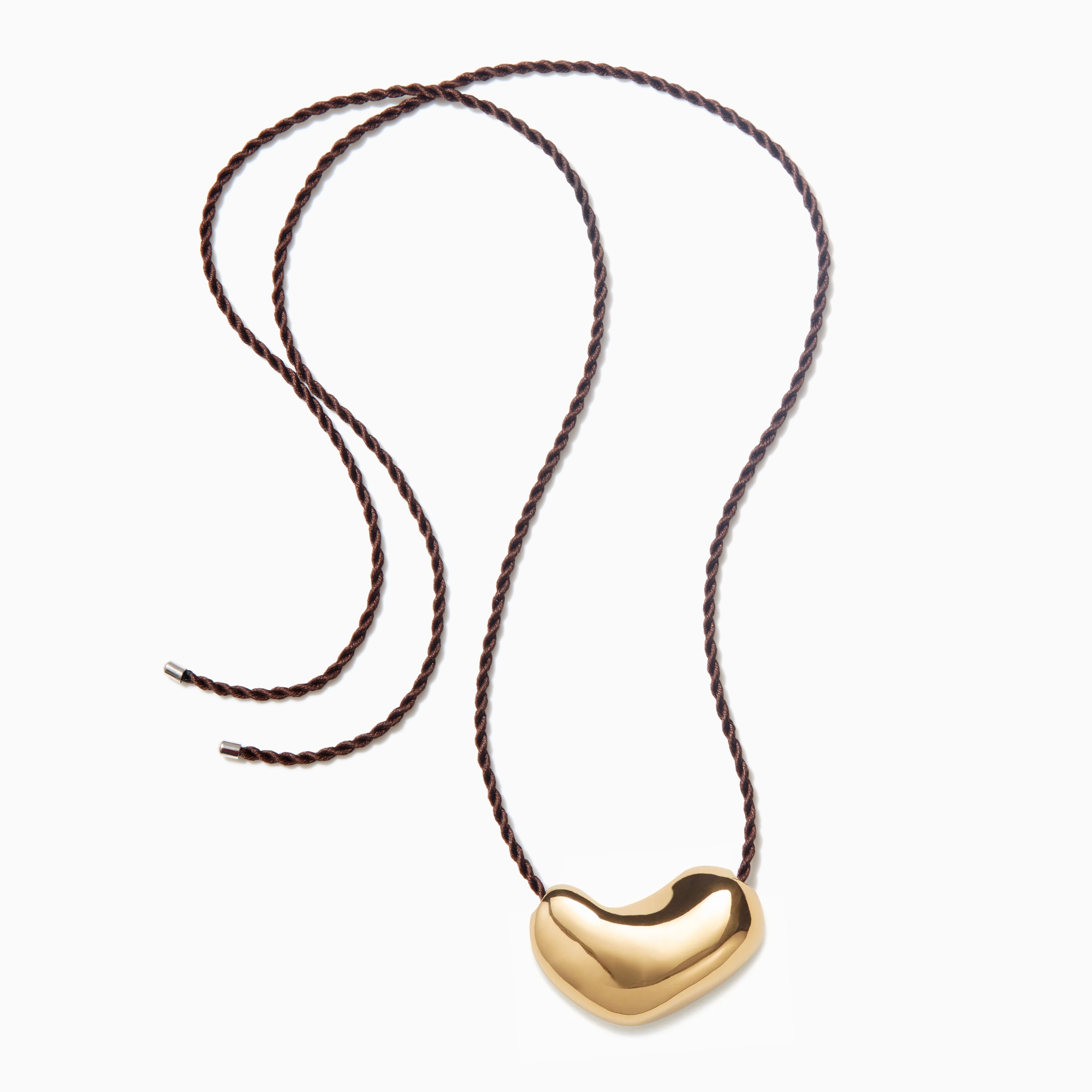 AGMES 18k Gold Vermeil Sculpted Heart Pendant on Chocolate Silk Cord.