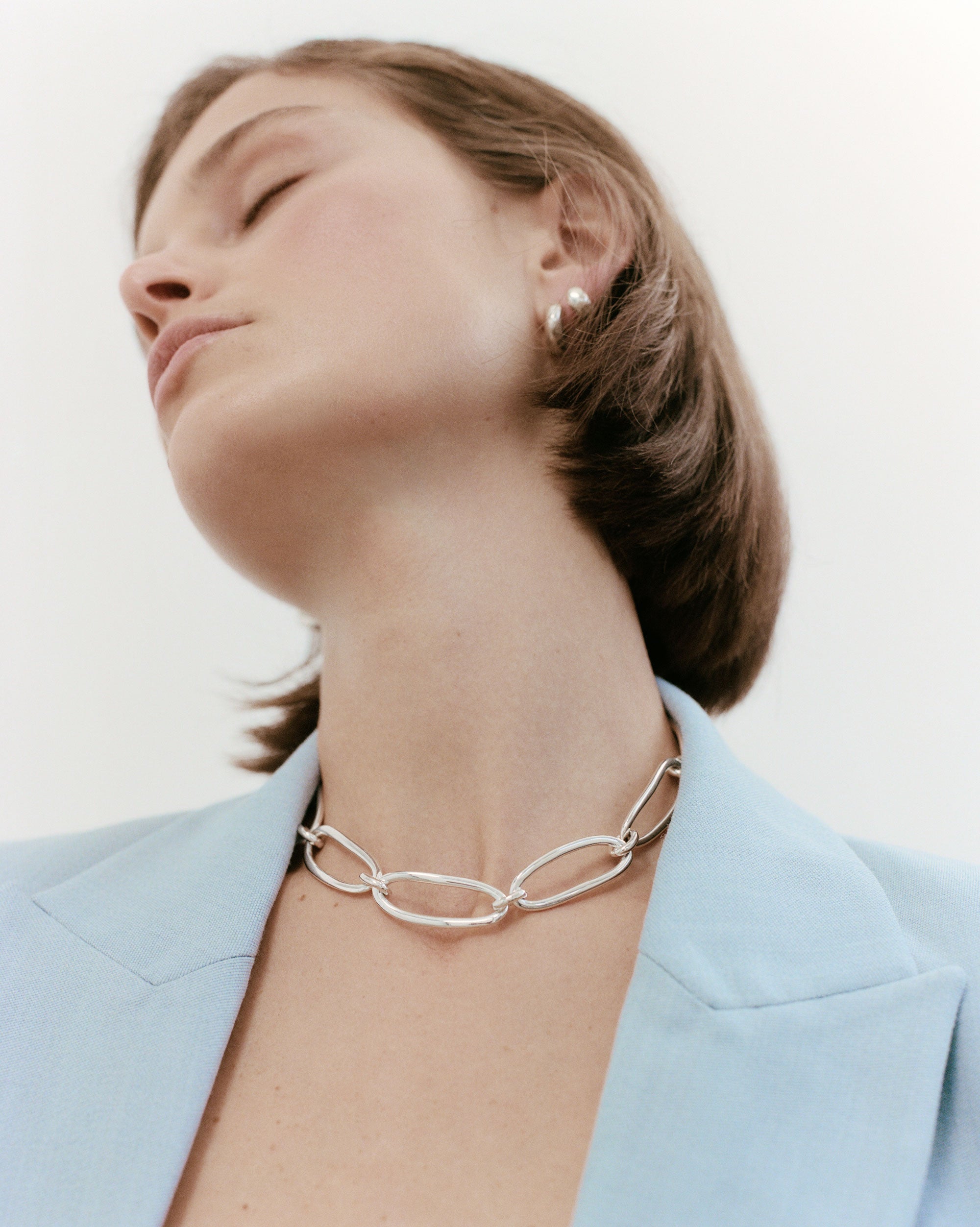 Woman wearing AGMES 0.925 Sterling Silver Dion Necklace with T-Bar Clasp. 