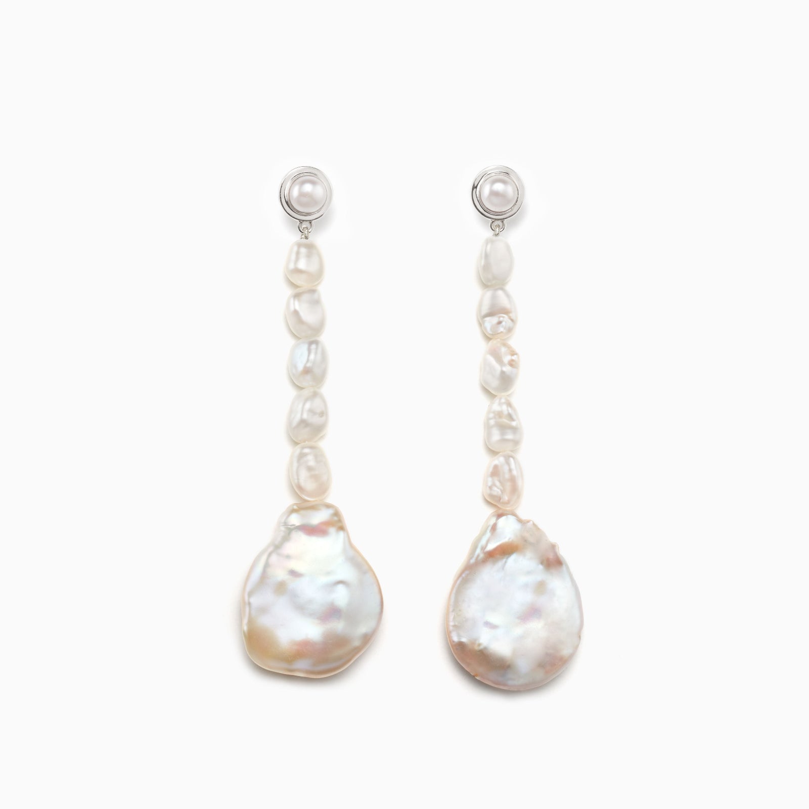 AGMES pearl drop earrings 0.925 sterling silver on white background.