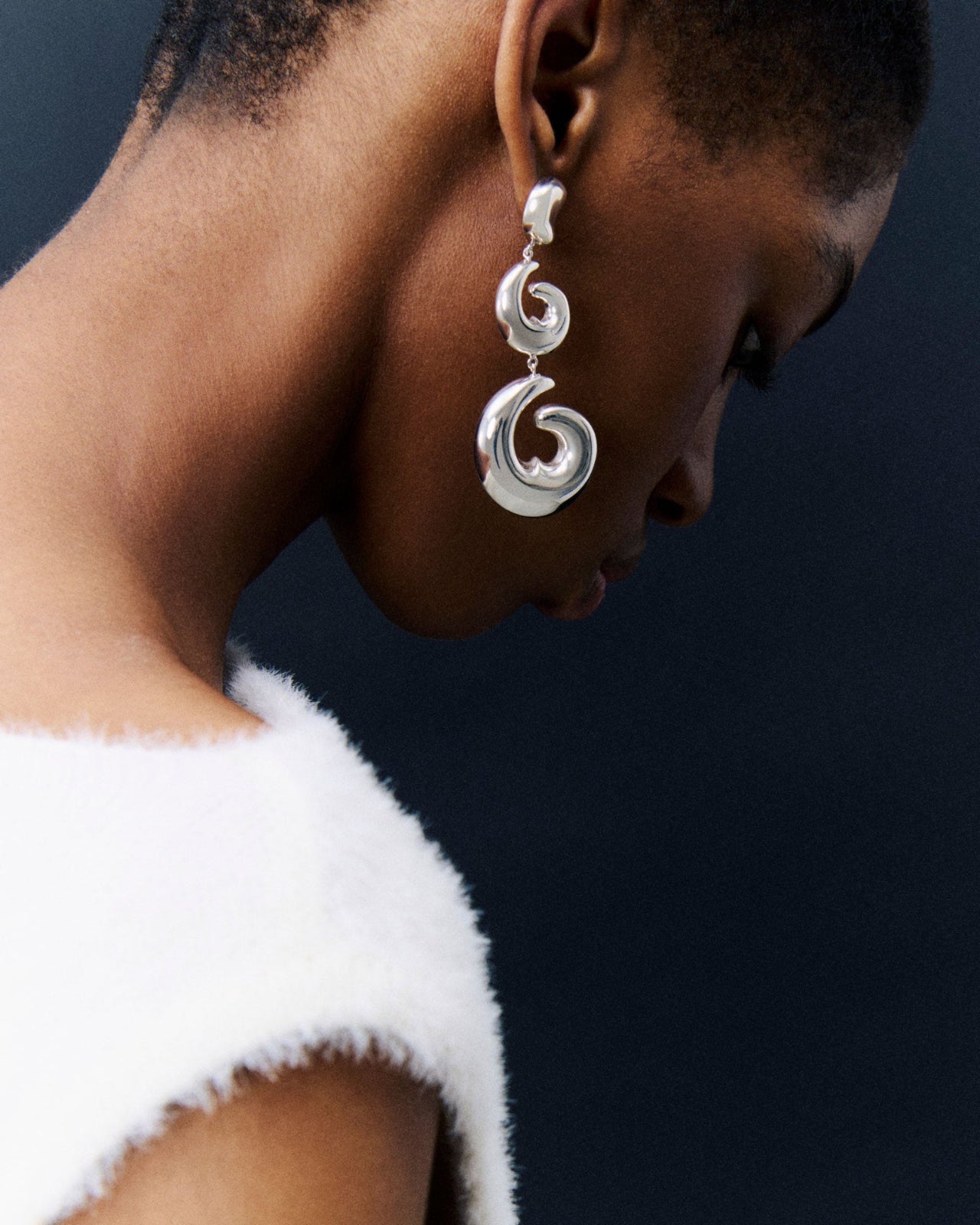 woman wearing sterling silver AGMES hilda earrings