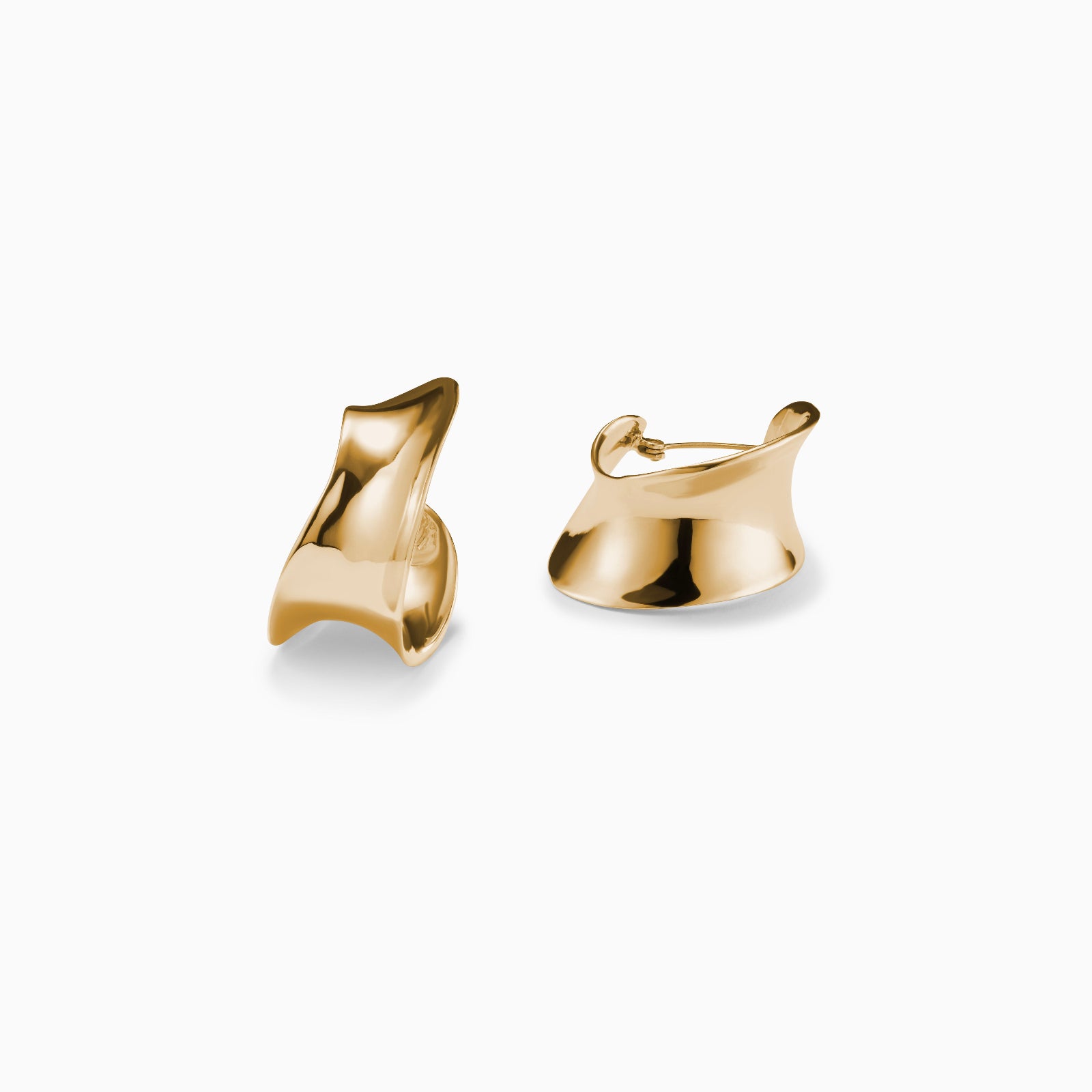 AGMES 18k gold vermeil Laila twist hoop earrings on white background.