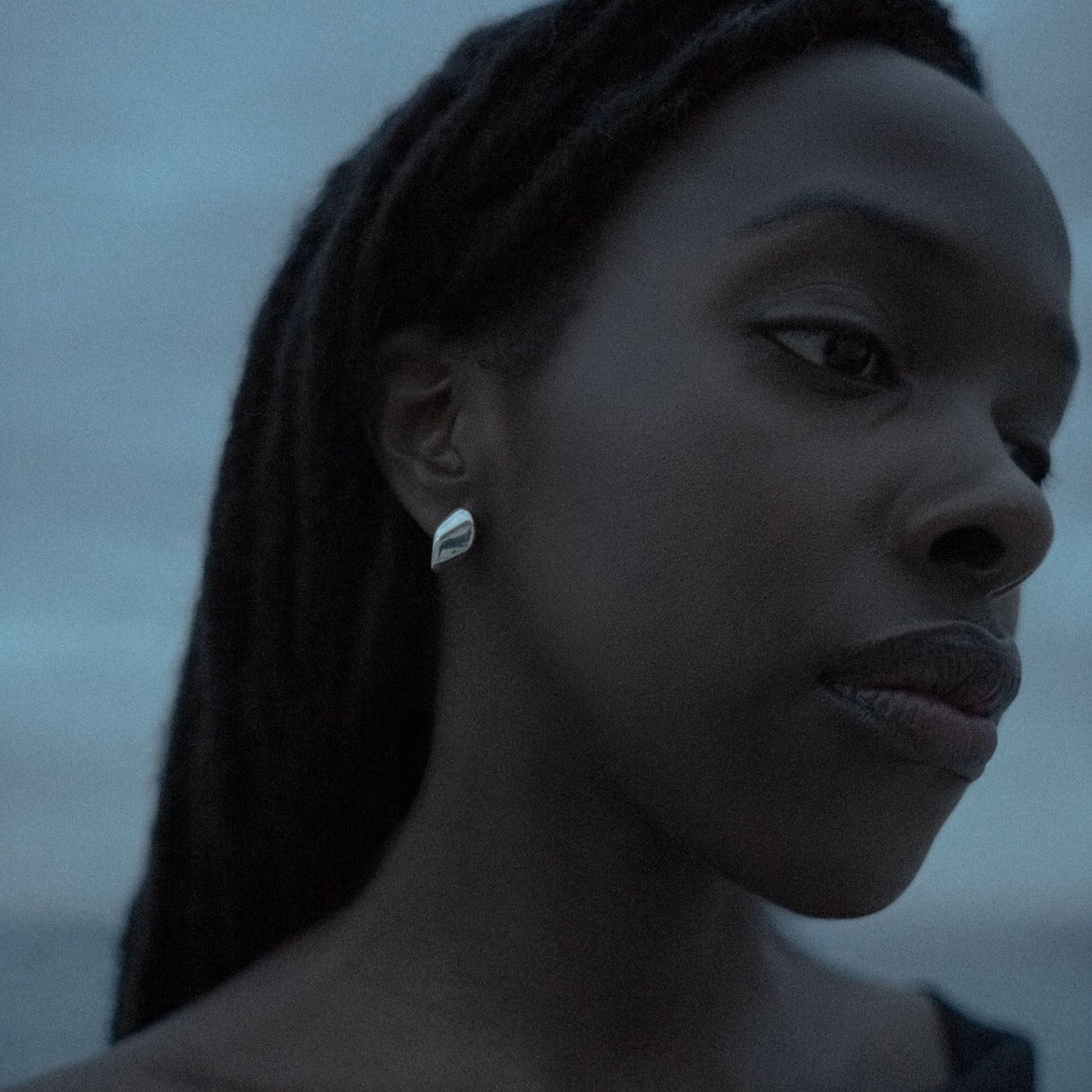 AGMES .925 Sterling Silver Nelle Hoop Earrings. Asymmetrical mirrored hoops. 