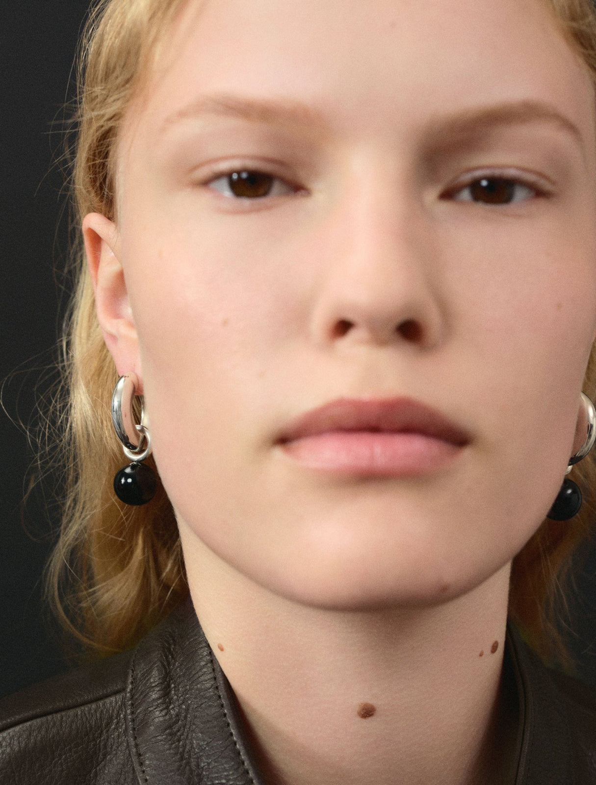 AGMES 0.925 sterling silver Sonia hoops with onyx drop embellishments.