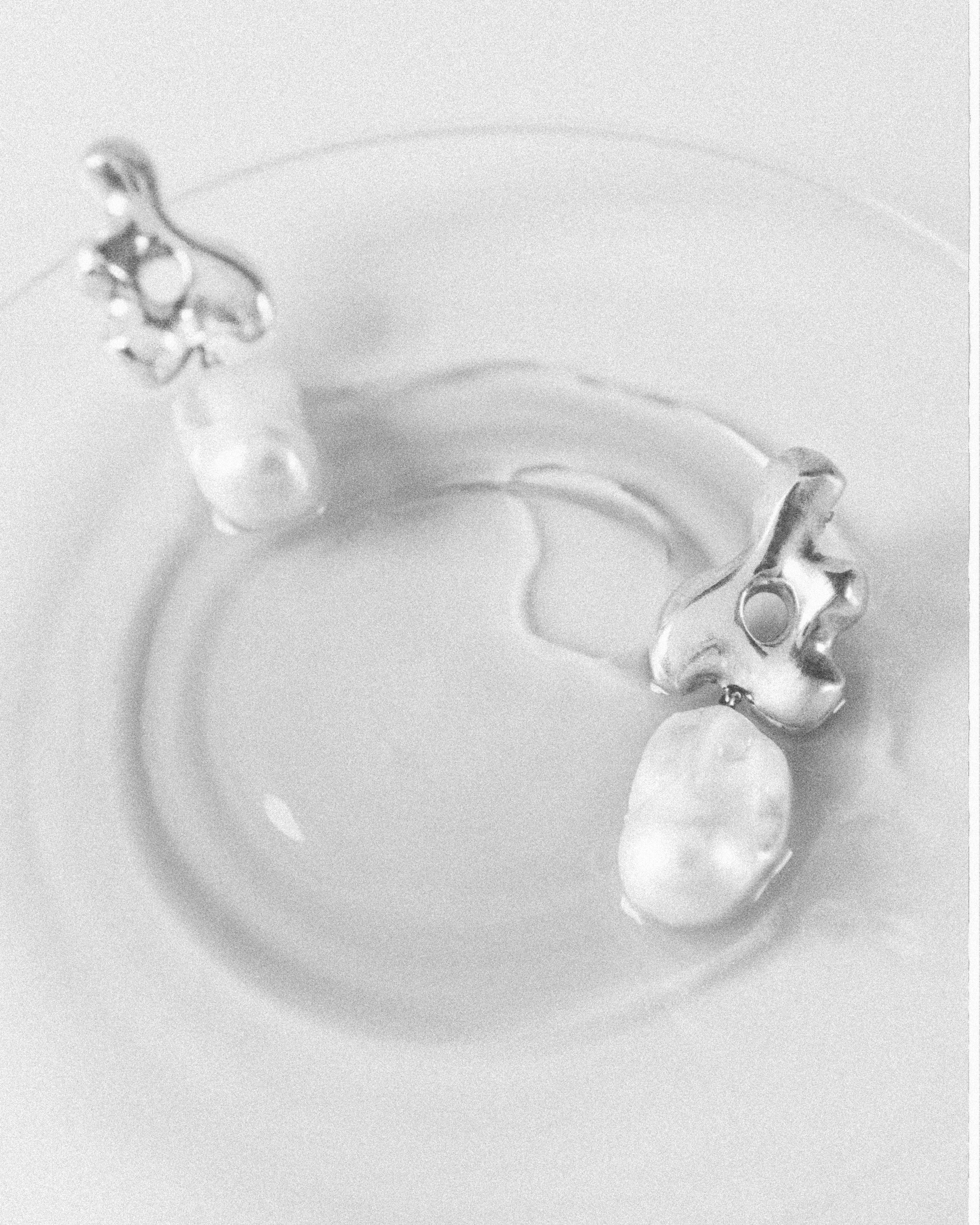 AGMES 0.925 sterling silver sculpted earrings with freshwater pearl drop. Simone Bodmer-Turner.