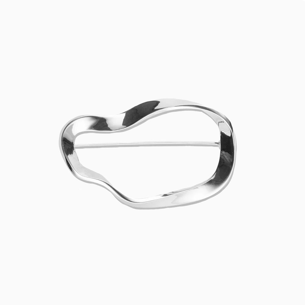 AGMES .925 Sterling Silver sculptural Vera Brooch on white background.