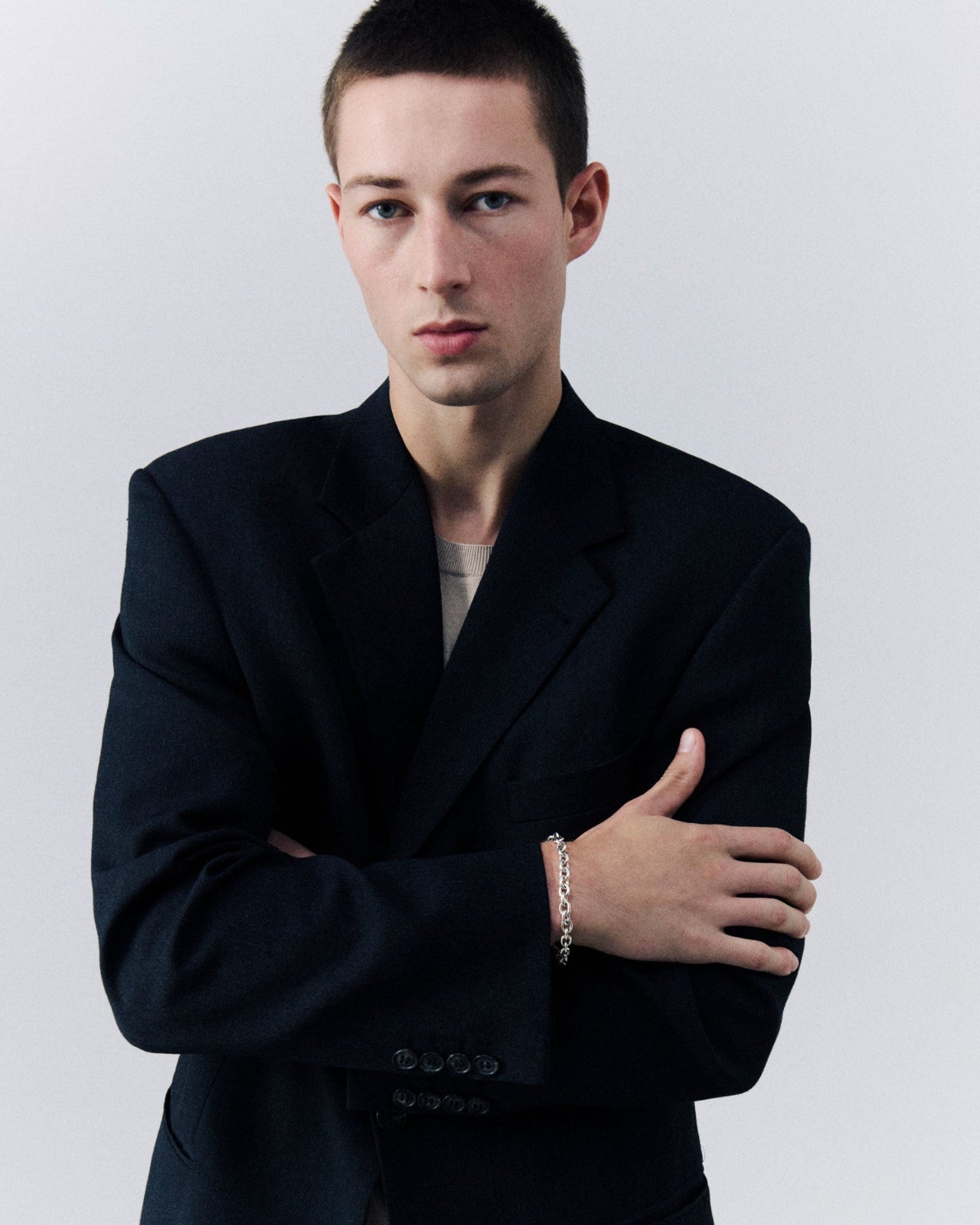 Man wearing AGMES .925 sterling silver classic chain bracelet