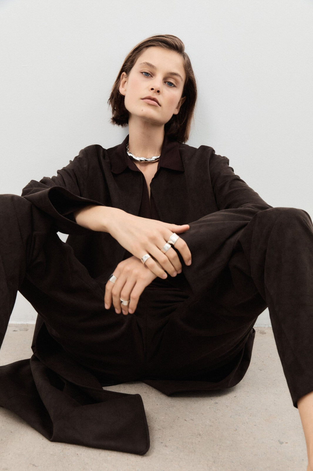 Woman wearing AGMES 0.925 sterling silver sculptural Astrid Choker 