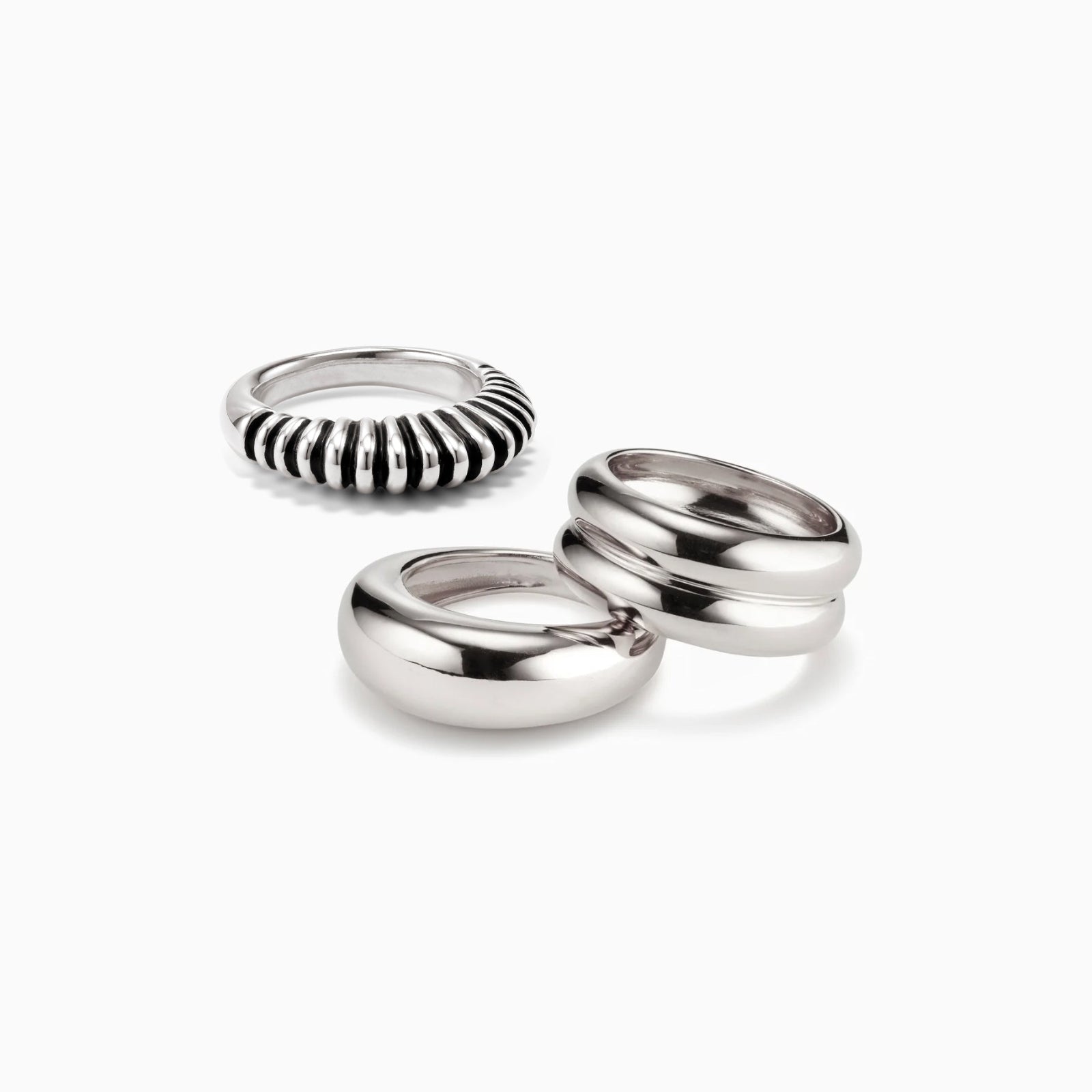 AGMES 0.925 sterling silver Bertrand Ring, Domed Ring, and Ridge Ring Set on white background.