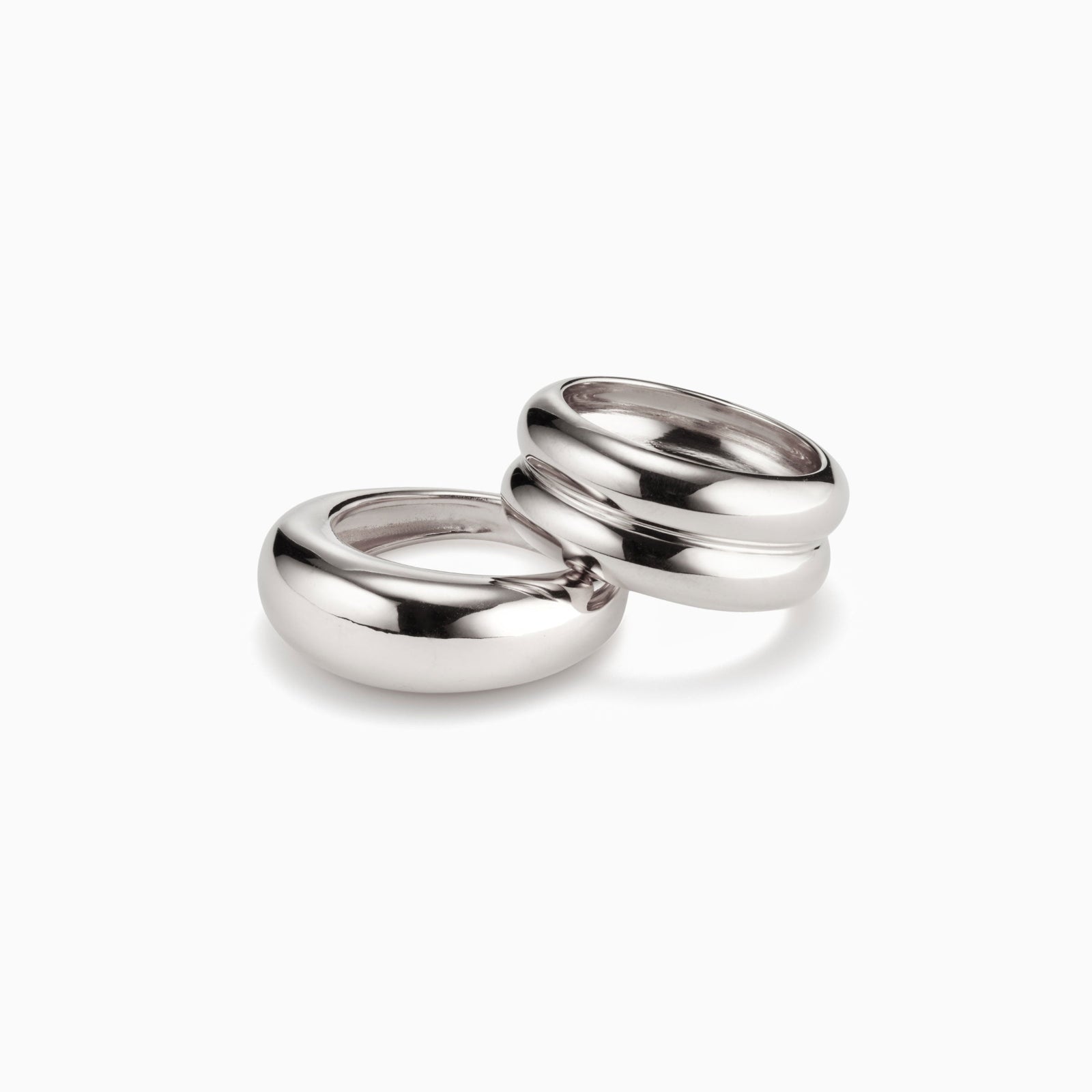 AGMES 0.925 sterling silver Domed Ring and Ridge Ring on white background.