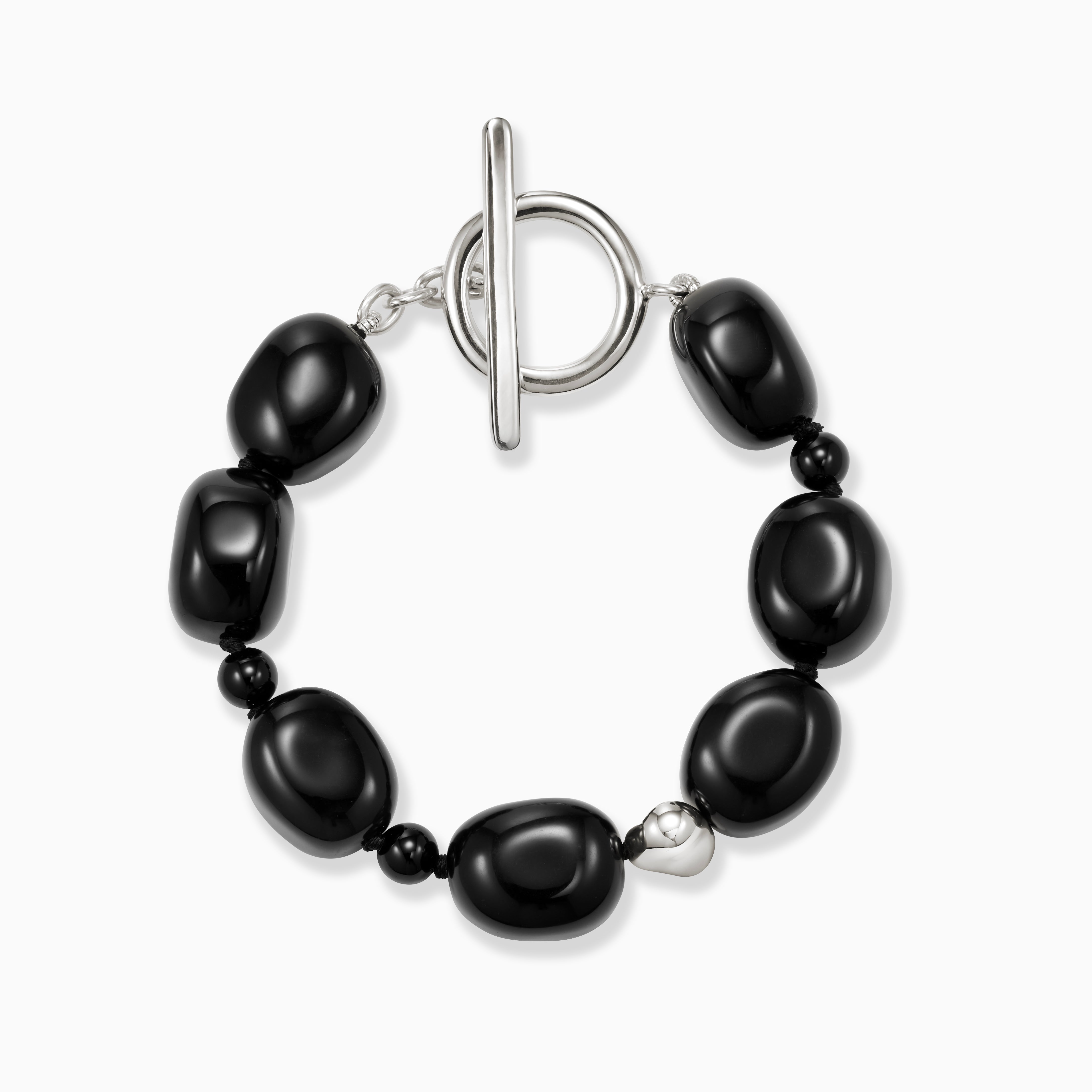 Black onyx beaded bracelet with .925 sterling silver accent on white background