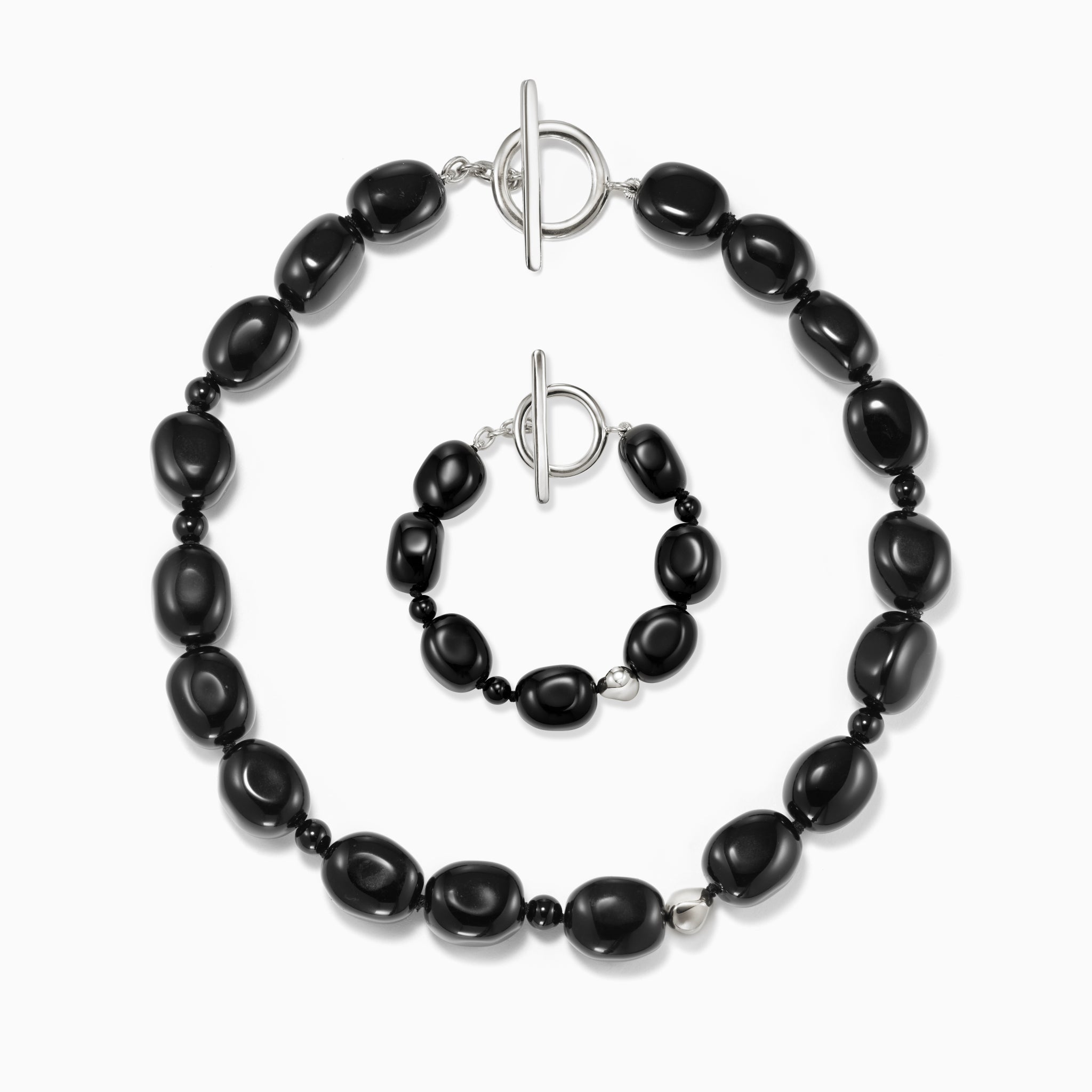 back onyx round beaded necklace and bracelet set with 0.925 sterling silver accents on white background
