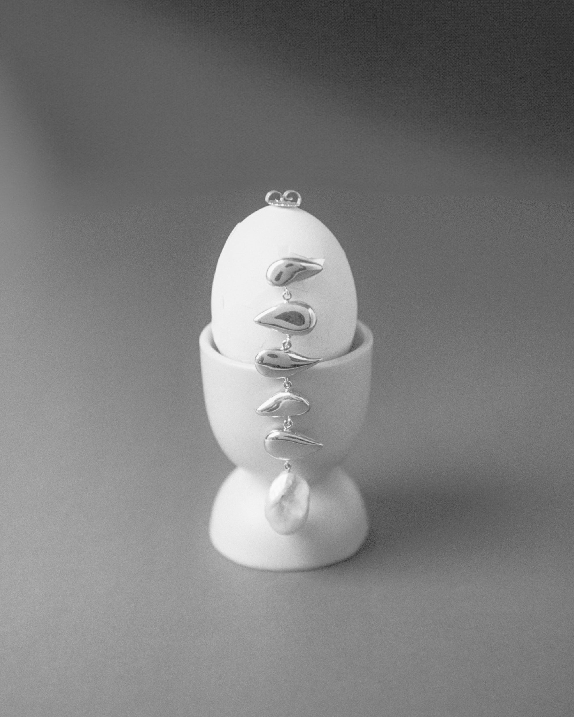 AGMES 0.925 sterling silver long drop pearl Flora earrings.