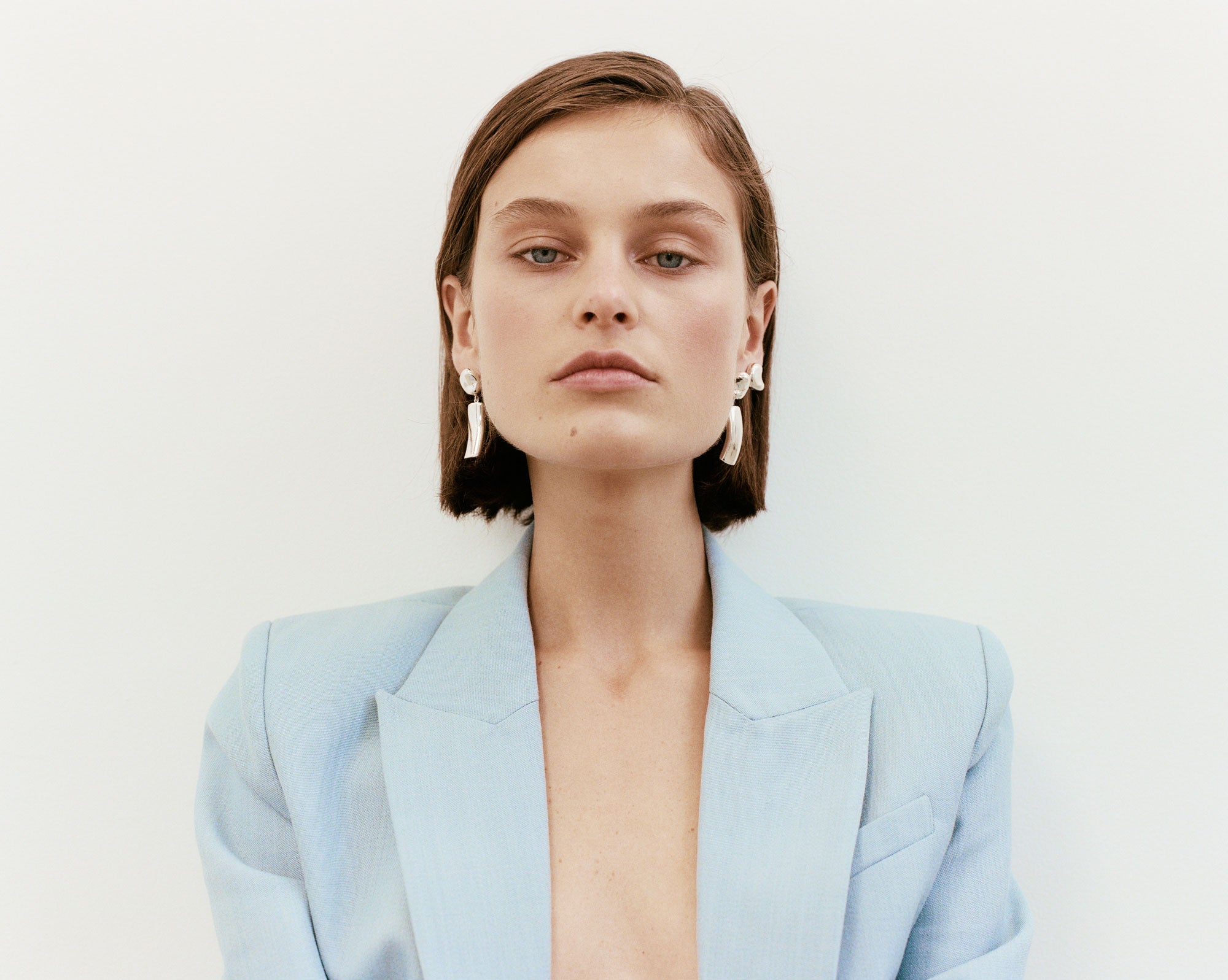 Woman wearing AGMES .925 Sterling Silver Short Ellsworth Clip-On Earrings.