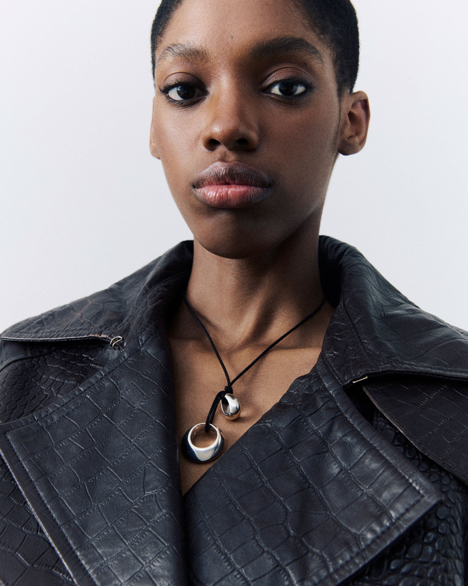 Model wearing .925 sterling silver AGMES Rae Pendant on Black Suede cord