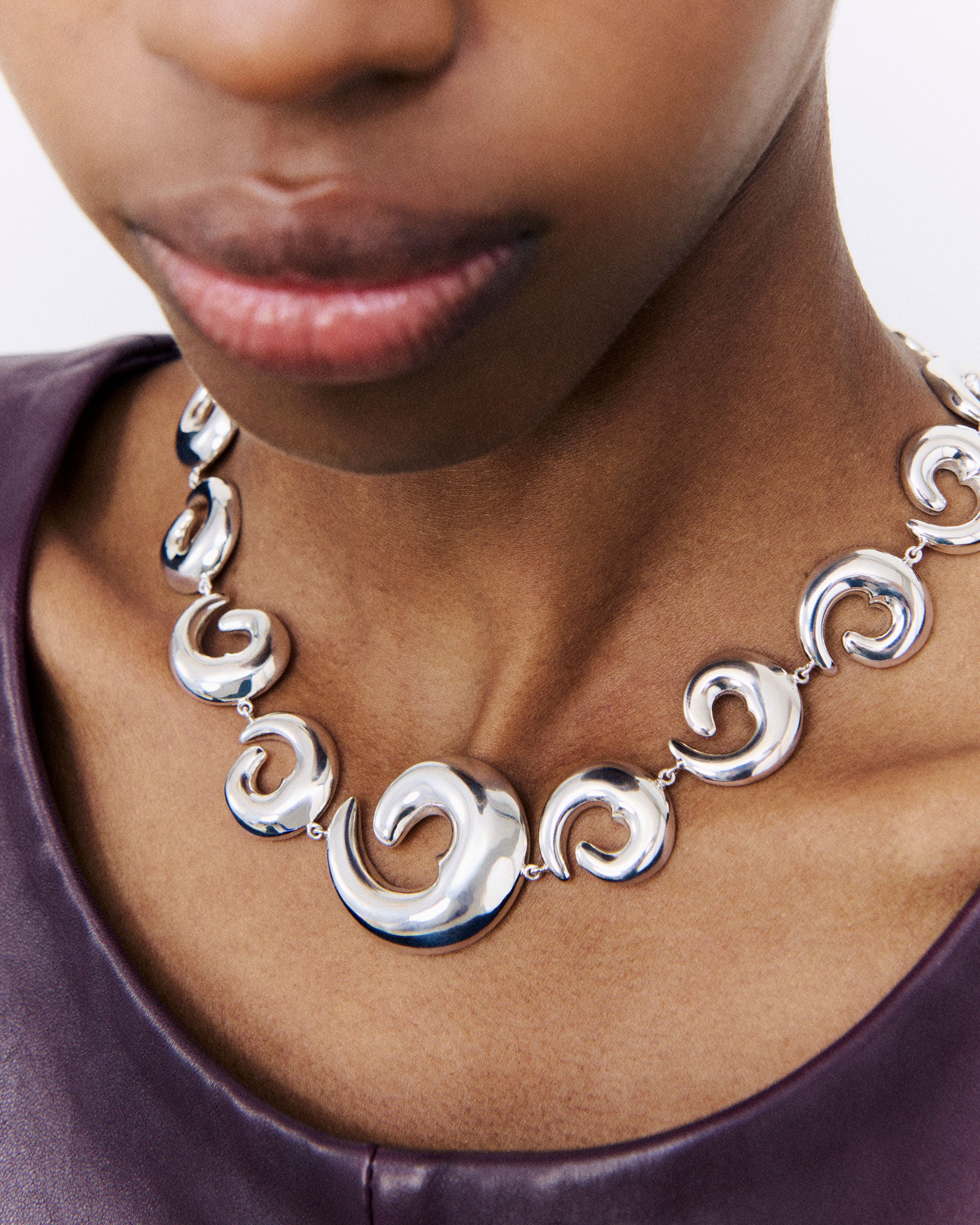 Close up of model wearing AGMES .925 Sterling Silver Fredrika Collar Necklace