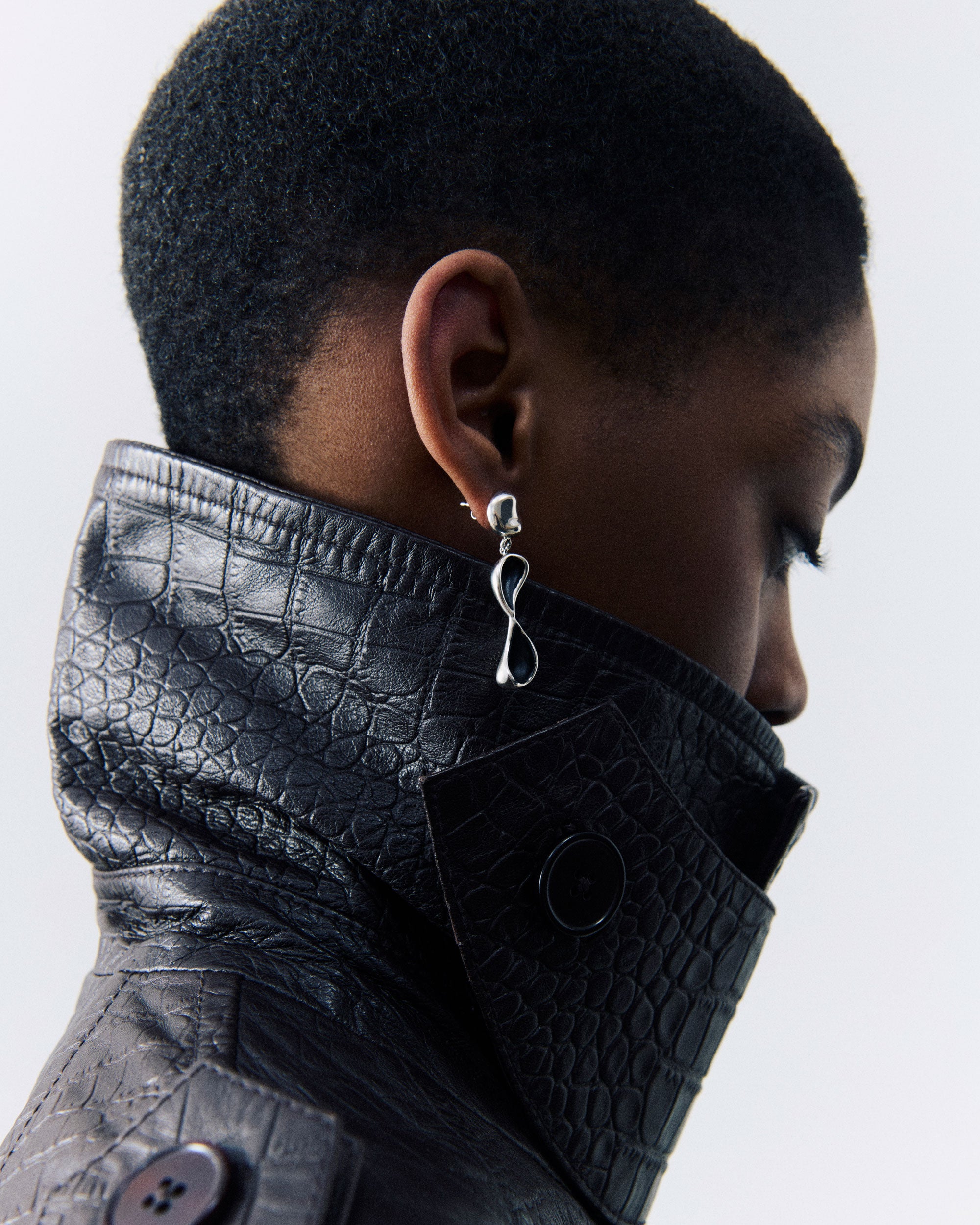 Model wearing .925 Sterling Silver AGMES Inti Earrings