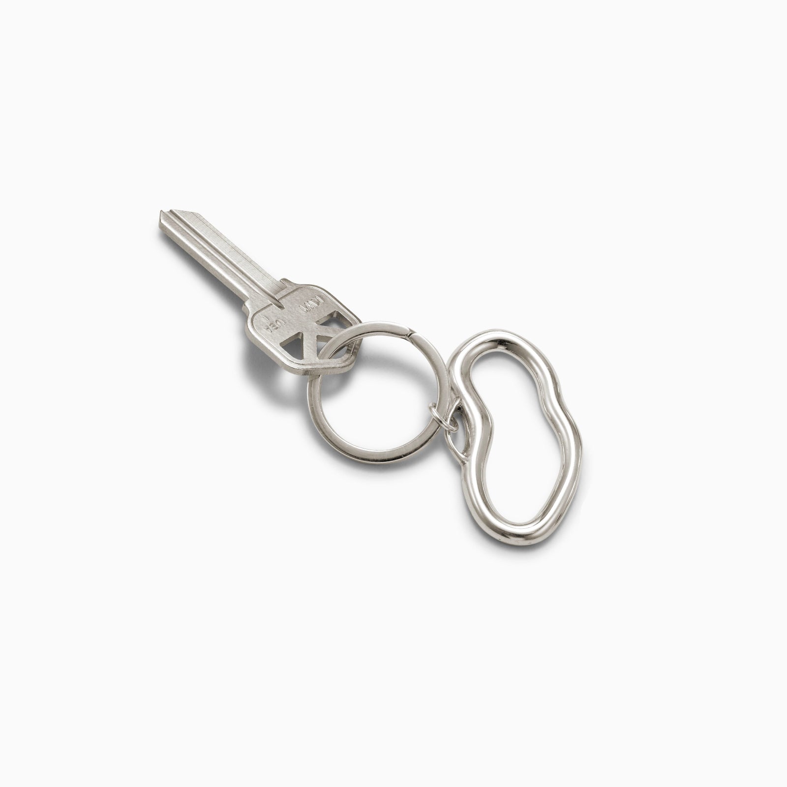 AGMES .925 sterling silver sculptural heart Sum of Parts Keychain on white background.