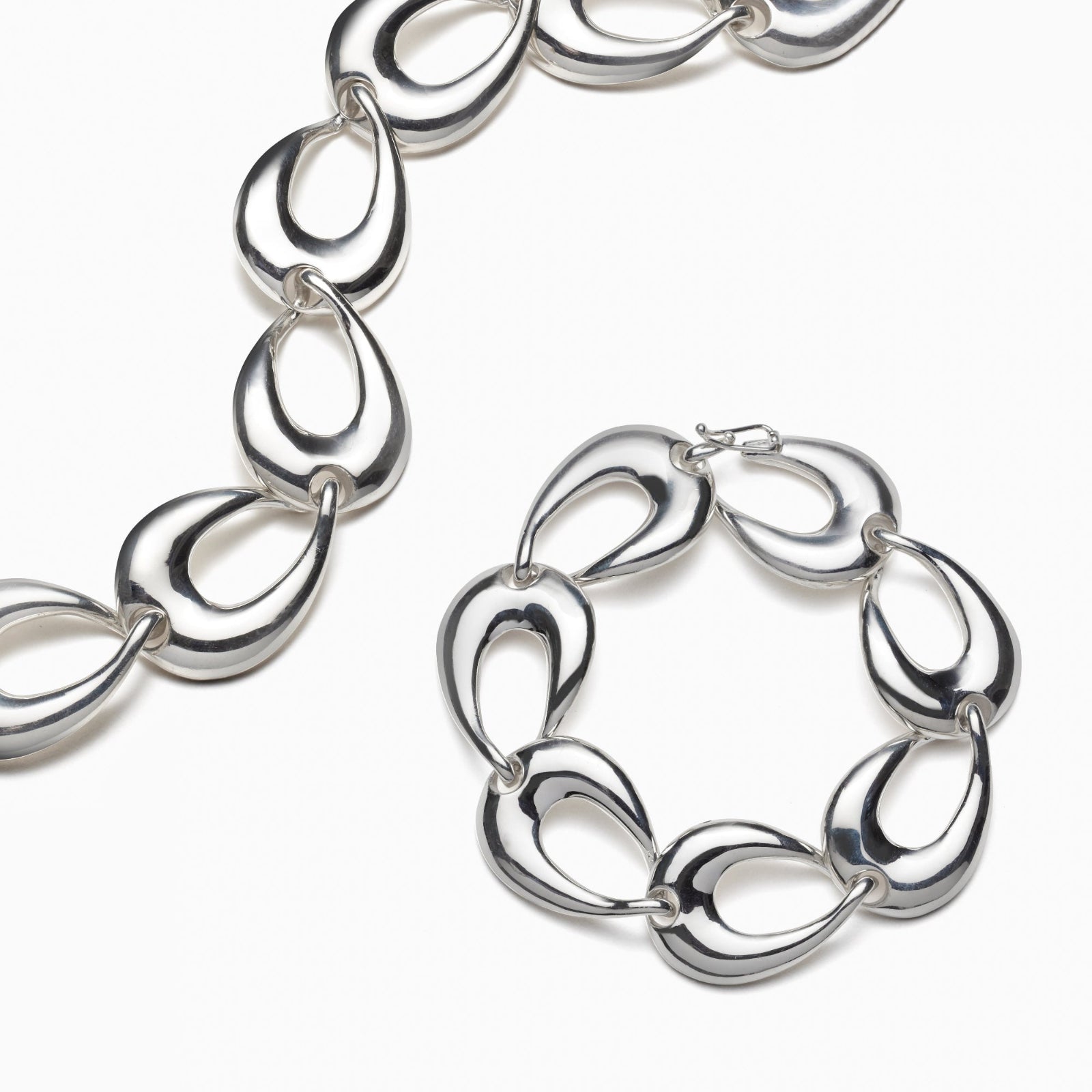 AGMES .925 sterling silver sculptural like Tilda Necklace and Tilda Bracelet on white background.