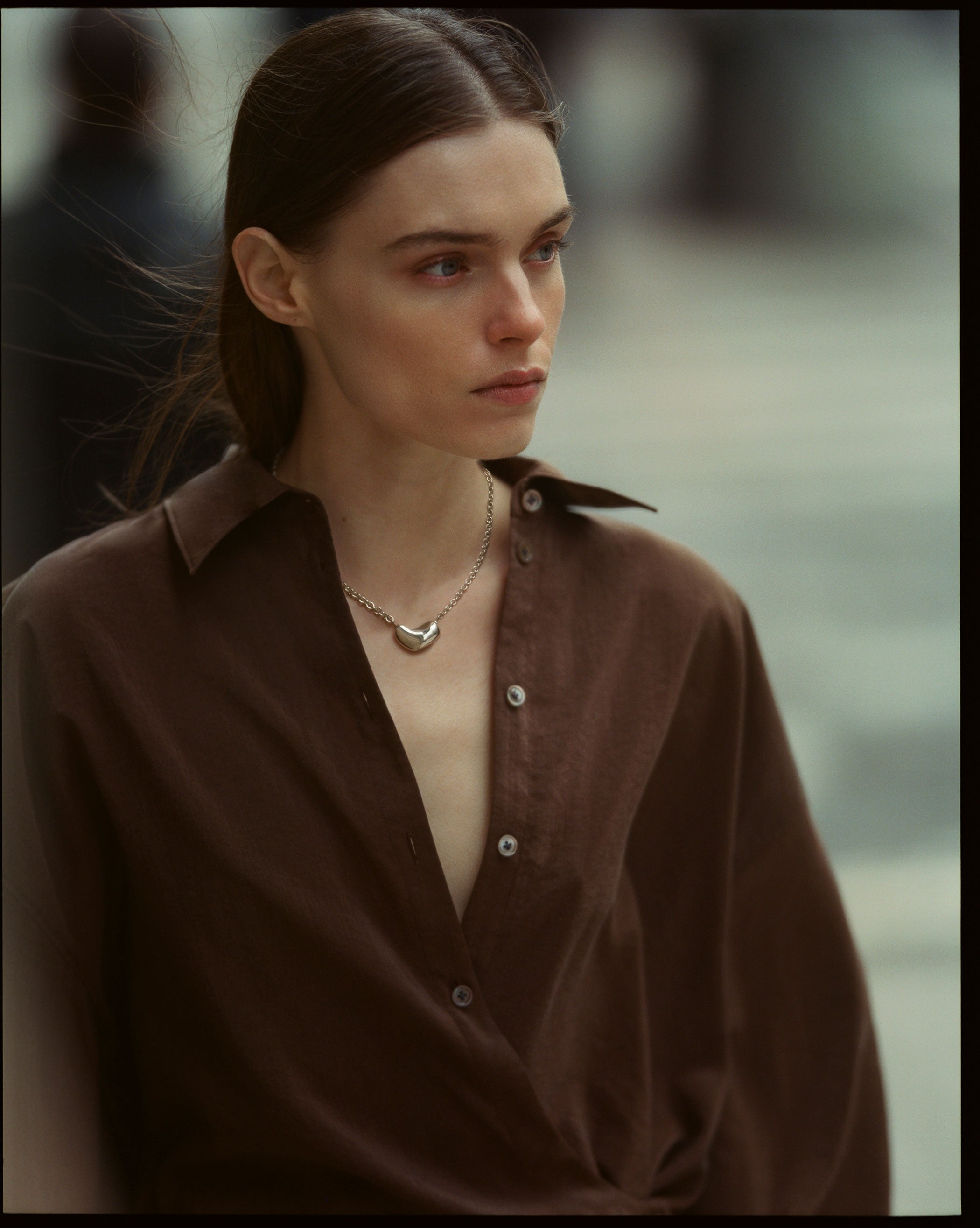 Model wearing .925 sterling silver Small Sculpted Heart chain Pendant II in new york city