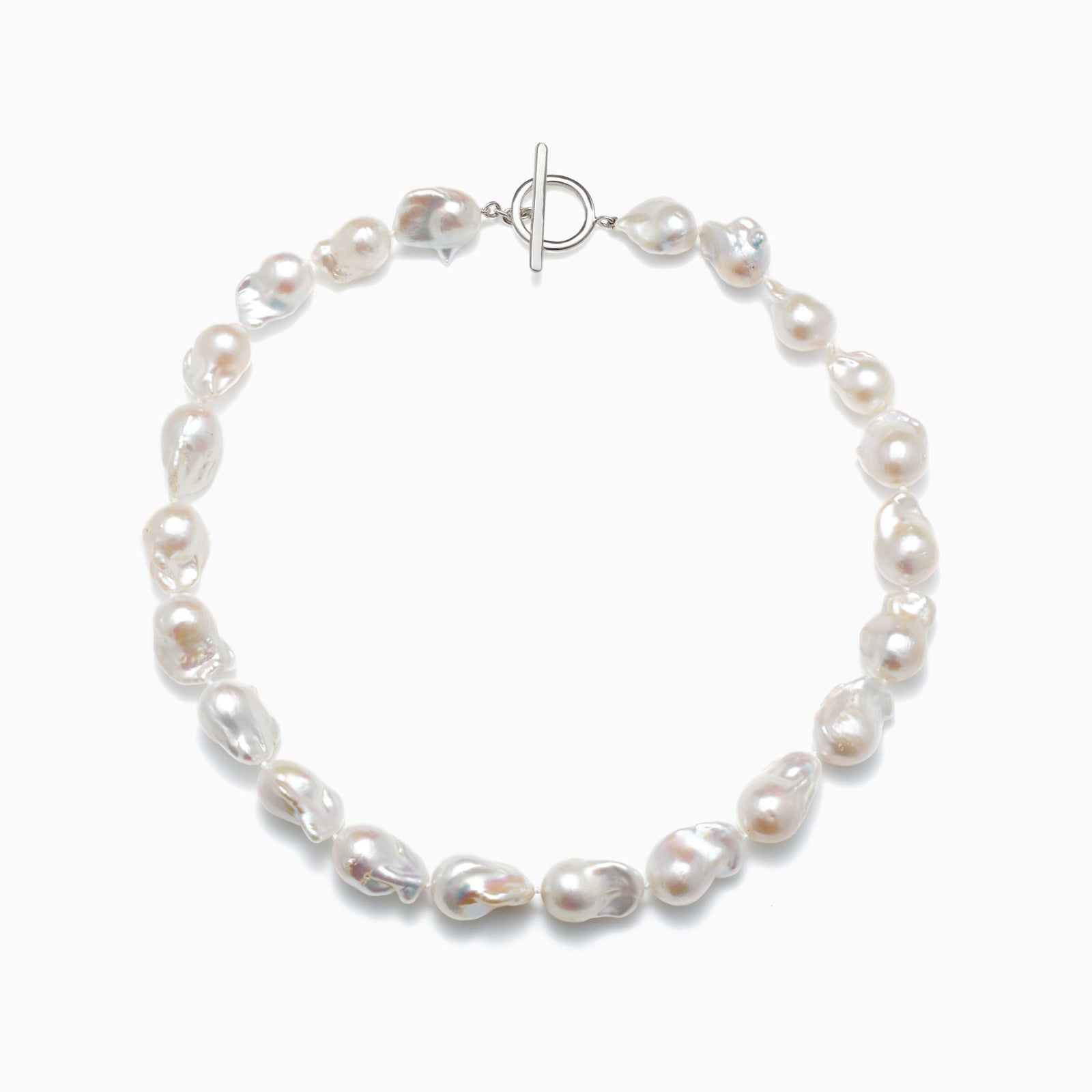 AGMES .925 sterling silver and freshwater Baroque Pearl Bracelet on white background.