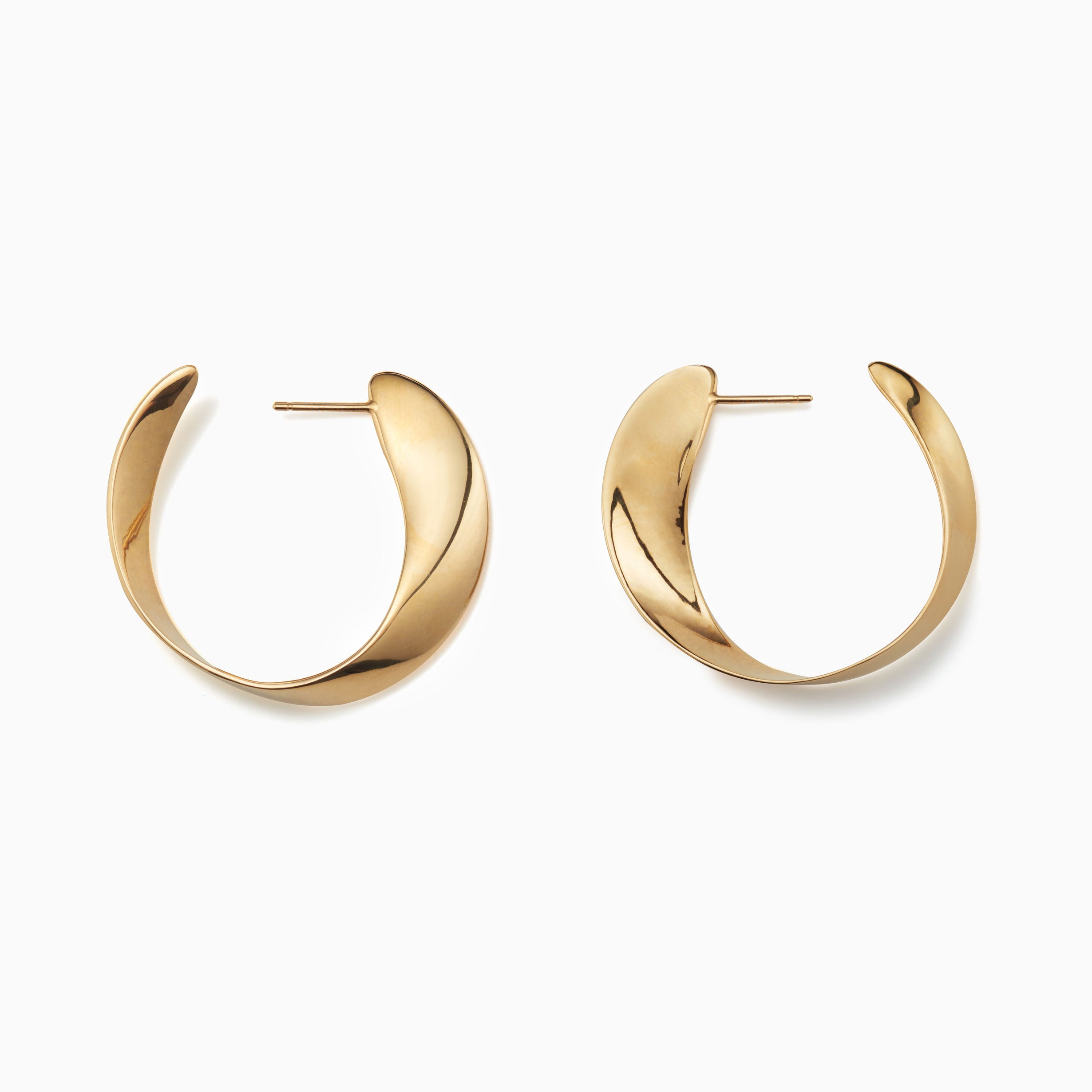 AGMES 18k gold vermeil twist hoop earrings.